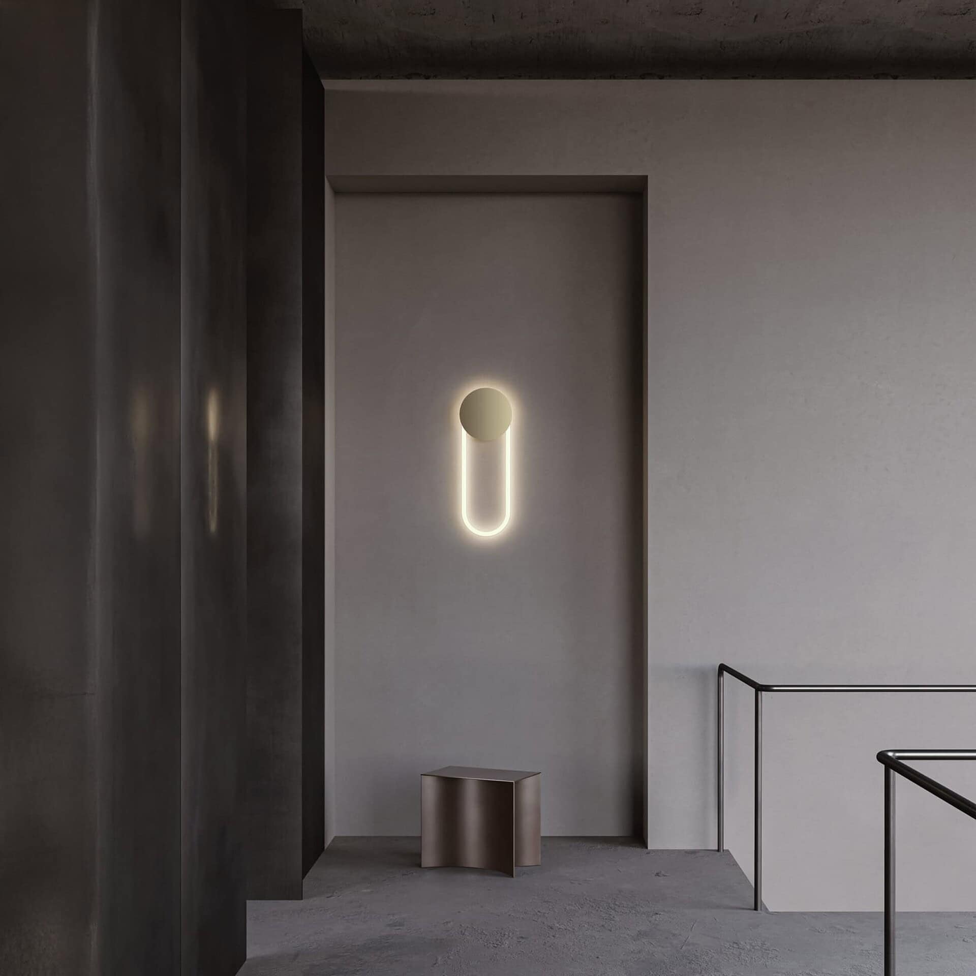 Modern minimalist wall sconce with LED lighting on beige wall, contemporary home decor.