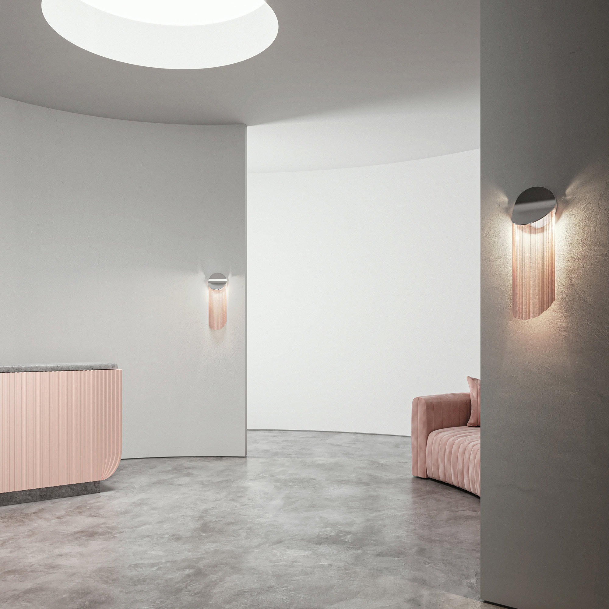 Elegant modern interior featuring pastel pink furnishings and minimalistic lighting.