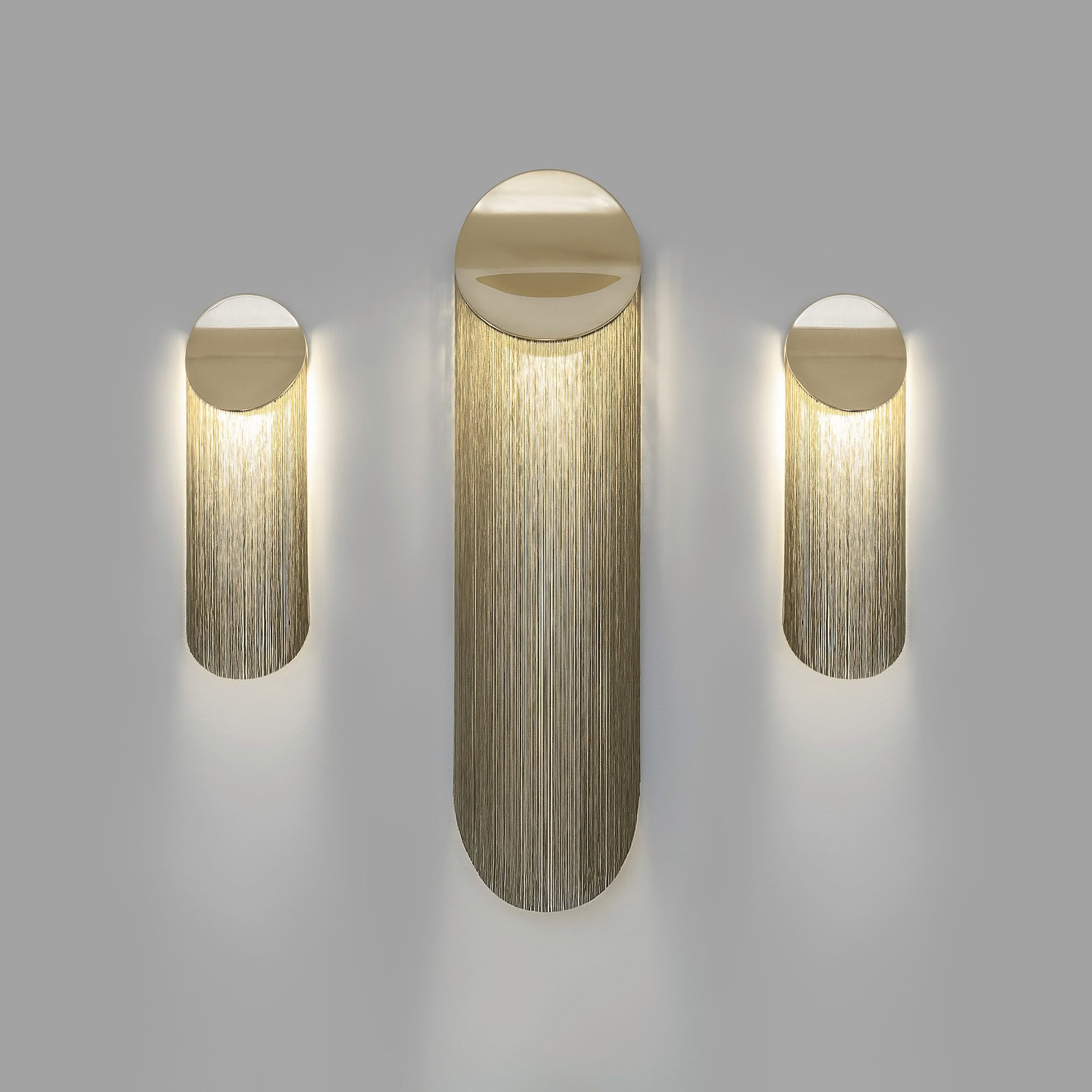 Elegant modern wall sconces with gold accents, ideal for upscale interior decor.