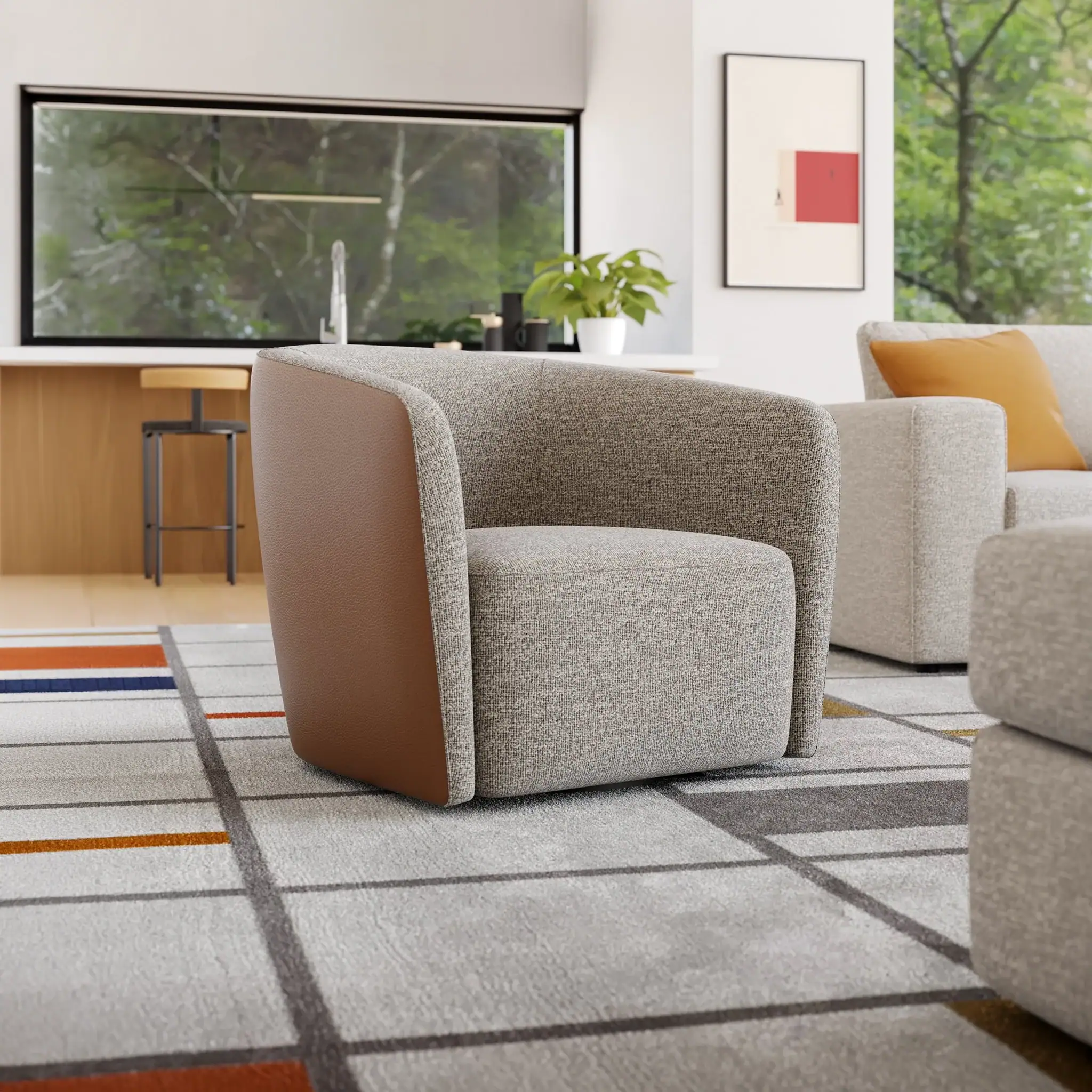 Contemporary grey lounge chair with plush upholstery in a stylish living room setting.