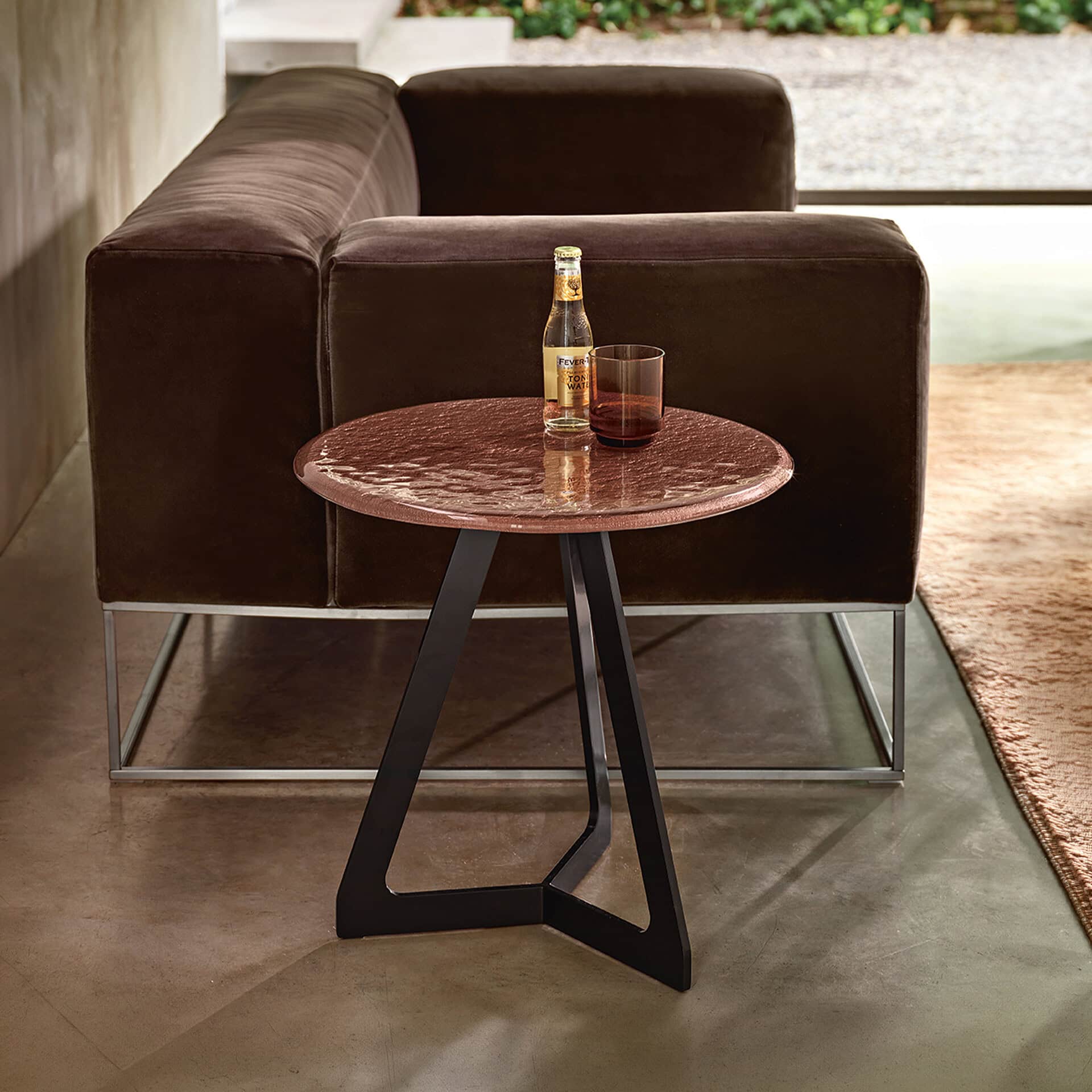 Elegant glass and marble coffee table with modern design.