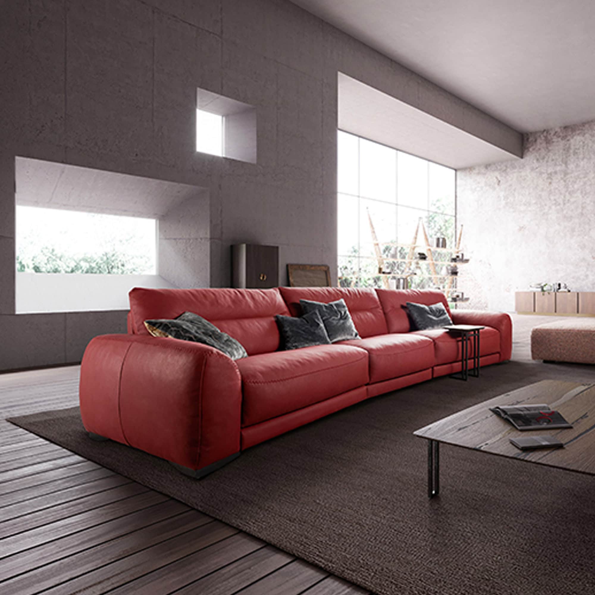 Modern red sectional sofa in a contemporary living room setting.
