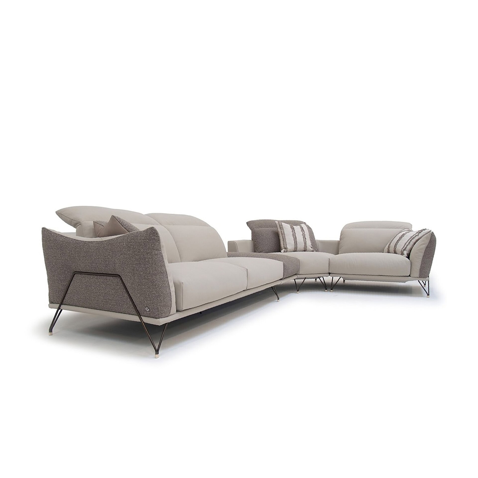 Studio shot of Dagor Modular Sectional Sofa in light neutral fabric with chaise lounge.