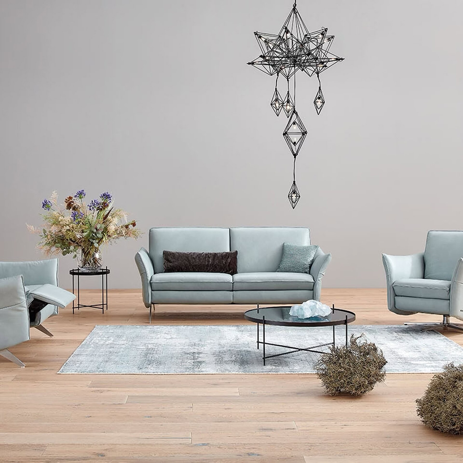 Siegfried 6902 Reclining Sofa in pale blue upholstery with matching sectional layout.