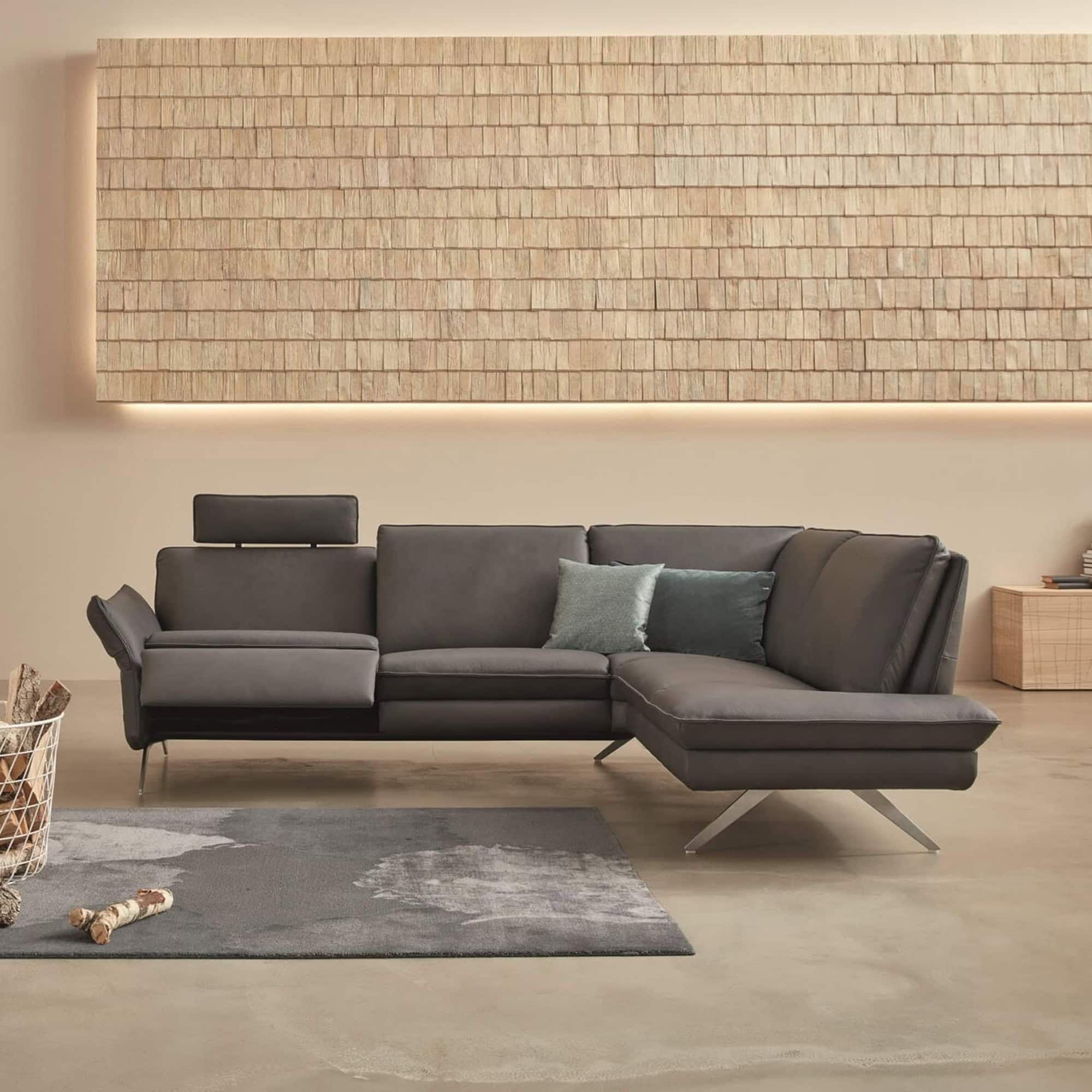 Recliner sofa with adjustable headrests and modern design, perfect for living rooms.