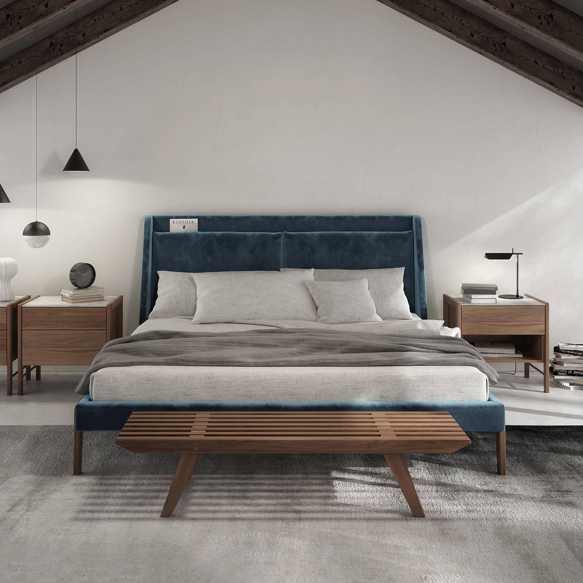 Luxurious bedroom featuring a blue velvet bed, minimalist wooden nightstands, and stylish decor elements.