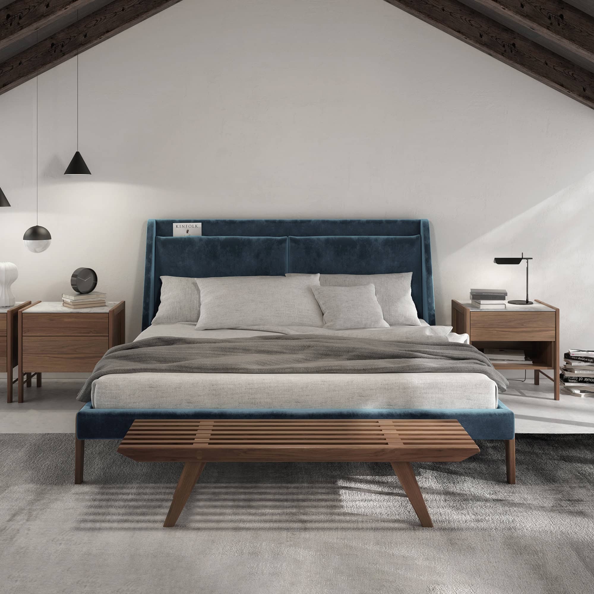 Luxurious bedroom featuring a blue velvet bed, minimalist wooden nightstands, and stylish decor elements.