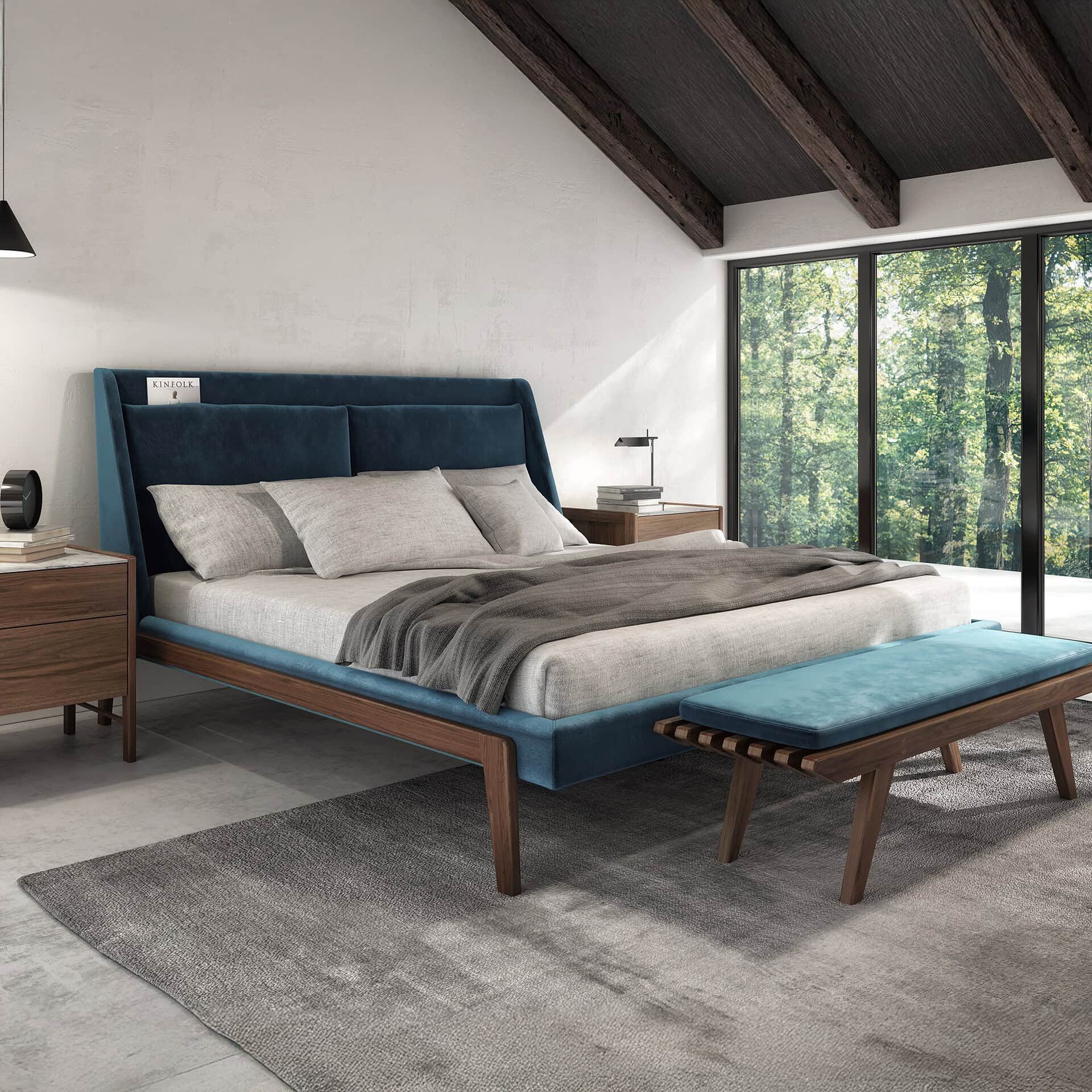 Luxury blue velvet upholstered bed with sleek wooden frame, natural light in minimalist modern bedroom.
