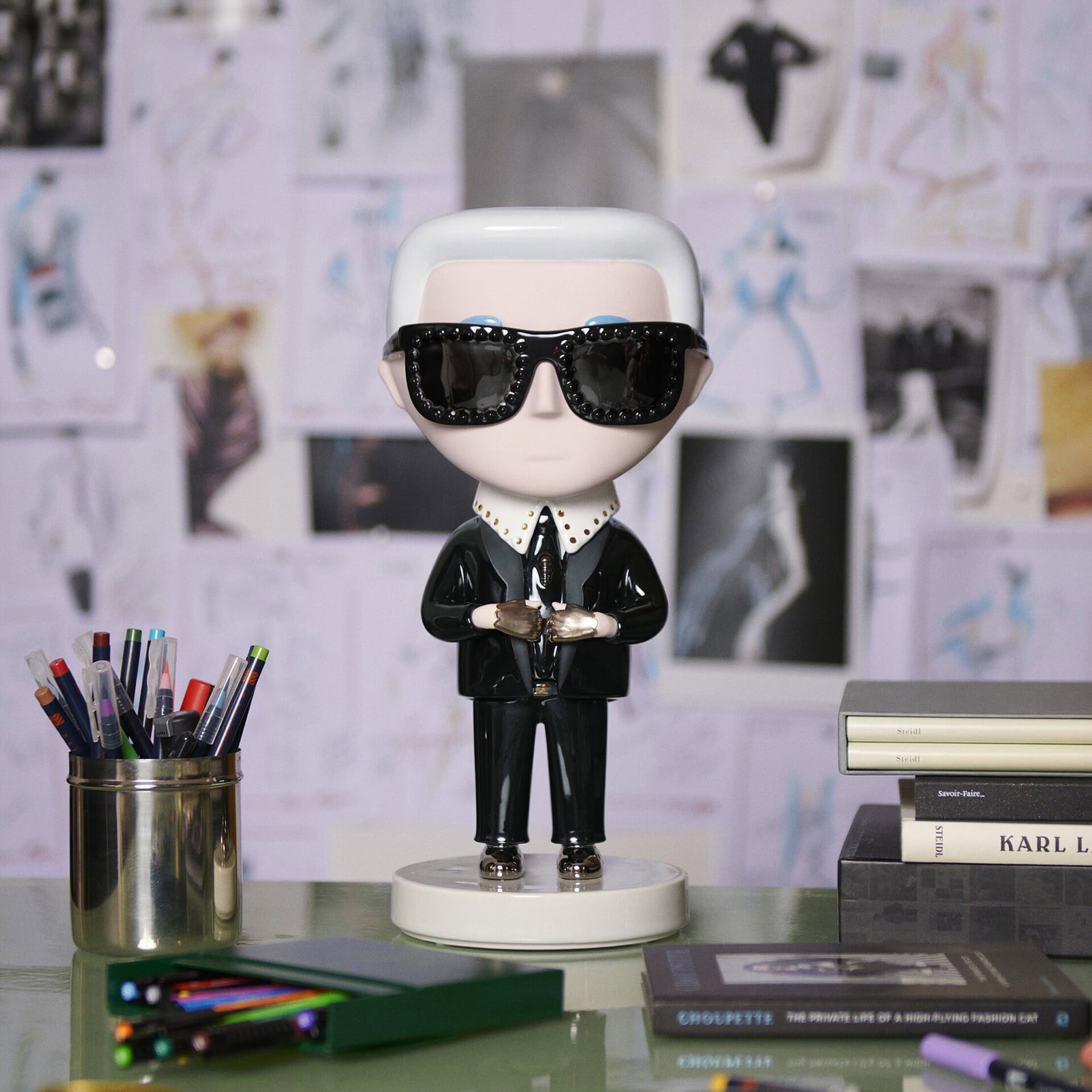 Decorative Bosa Ceramics figurine with sunglasses and suit.