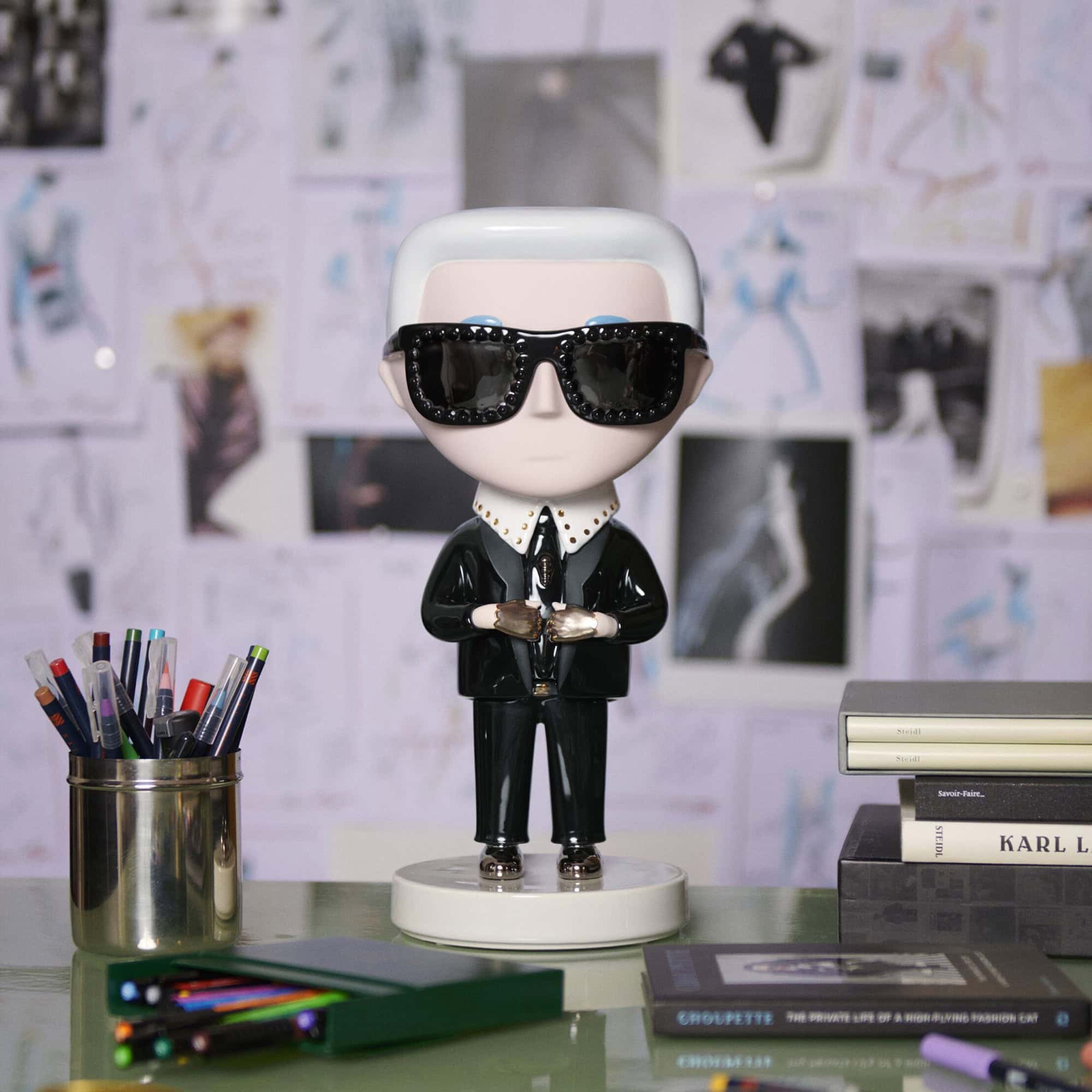 Decorative Bosa Ceramics figurine with sunglasses and suit.