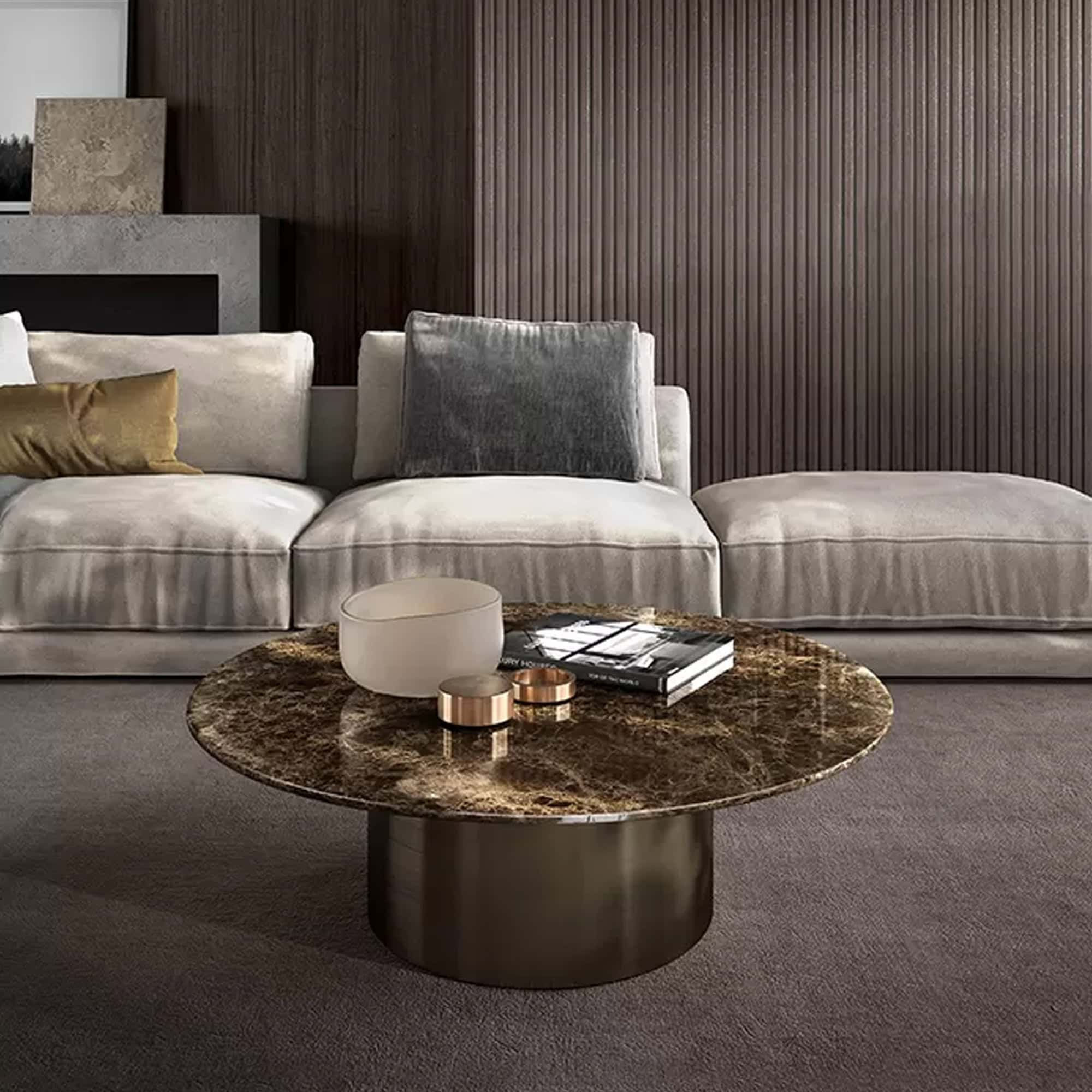 Living room setting with Cilindro Coffee Tables in marble top and cylindrical metal base.