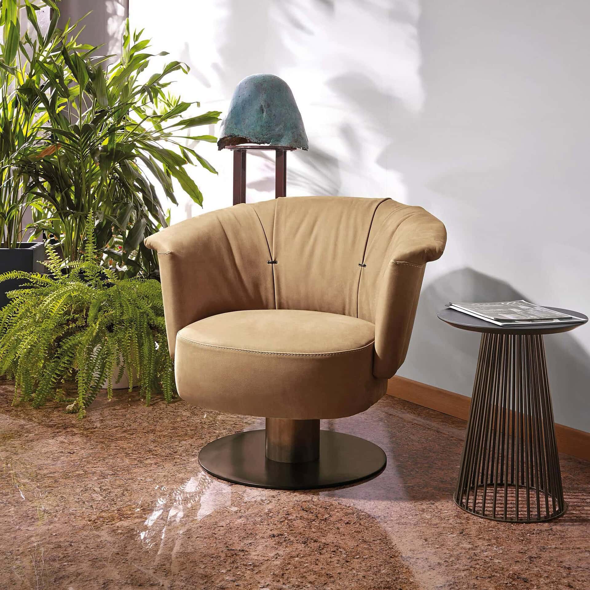 Modern Gamma lounge chair with beige upholstery and unique design.