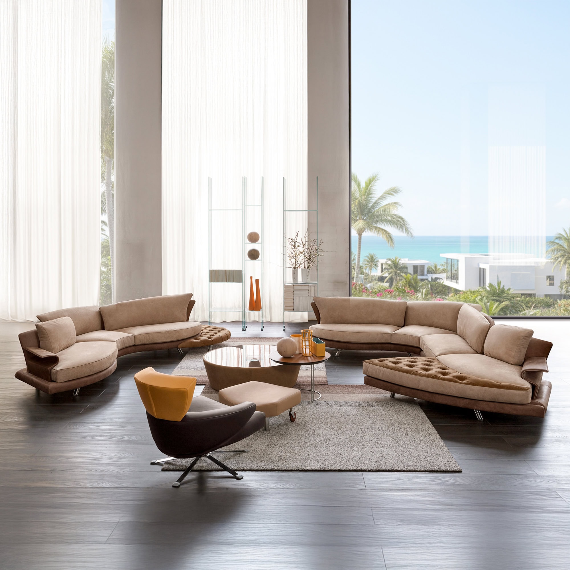 Luxurious modern living room with custom sectional sofa and ocean view.