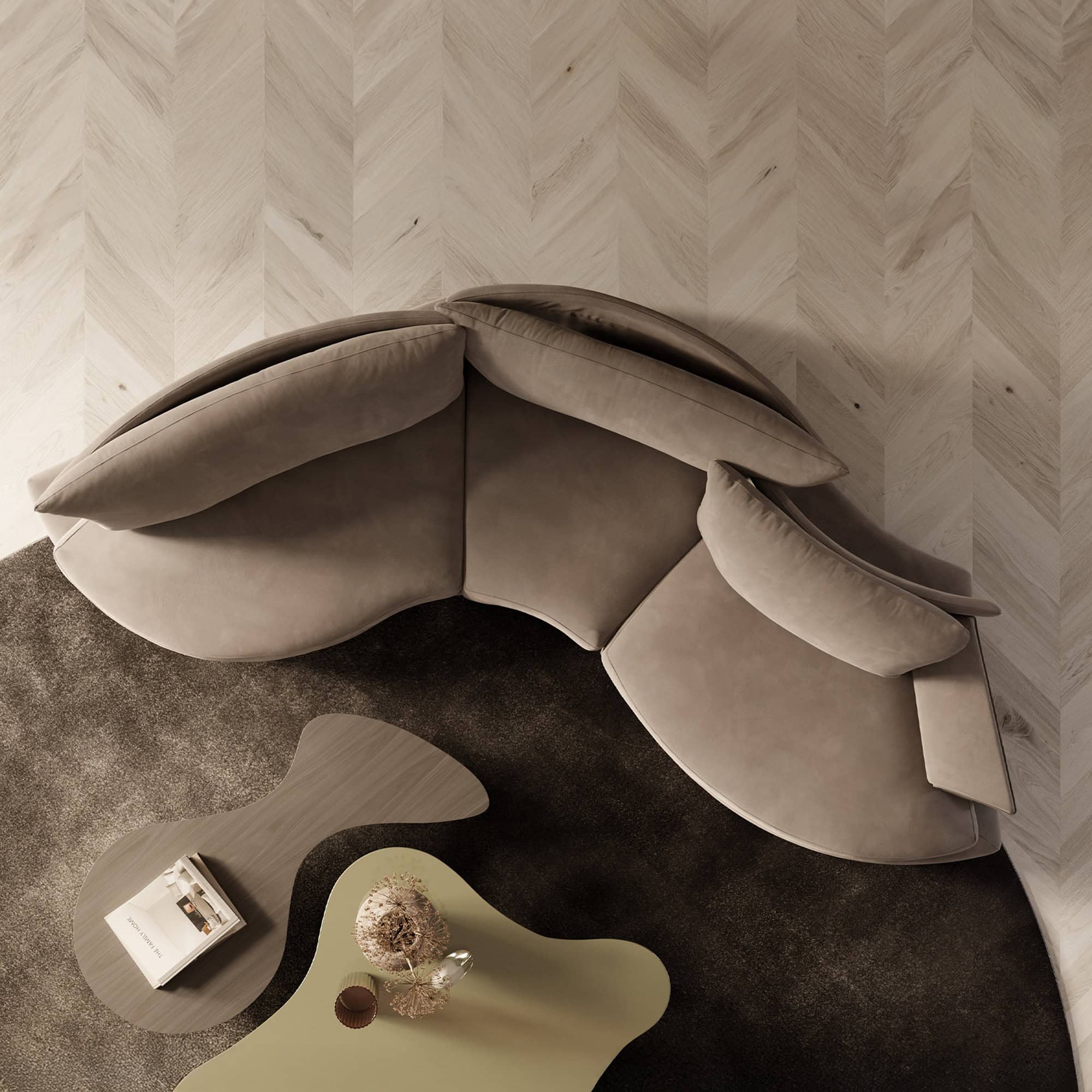 Curved sectional Super Roy sofa in soft neutral tones paired with a sculptural coffee table and accent chairs in a luxurious living space.