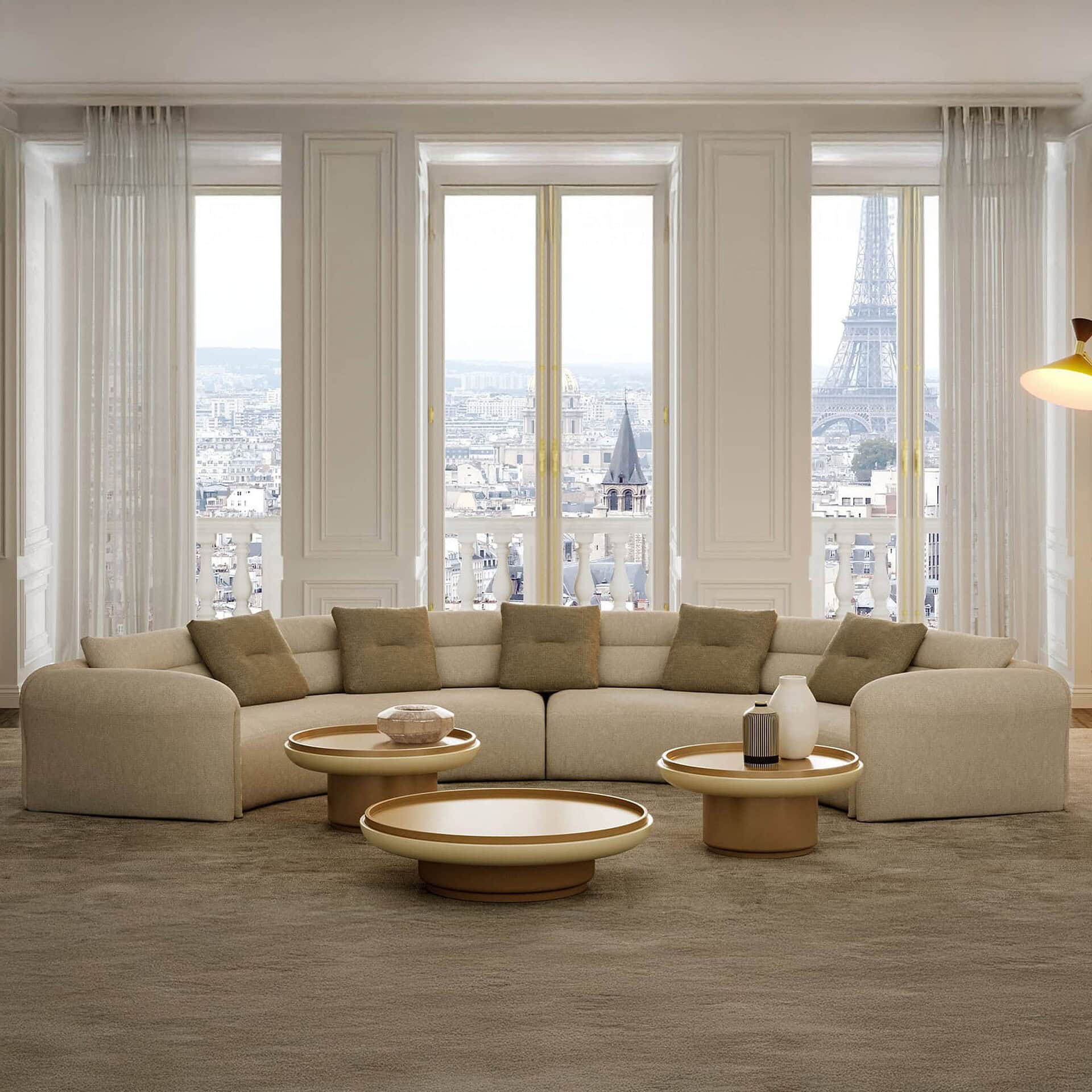 Quentin Amphitheatre Circular Modular Sofa in front of floor-to-ceiling windows with a circular arrangement.