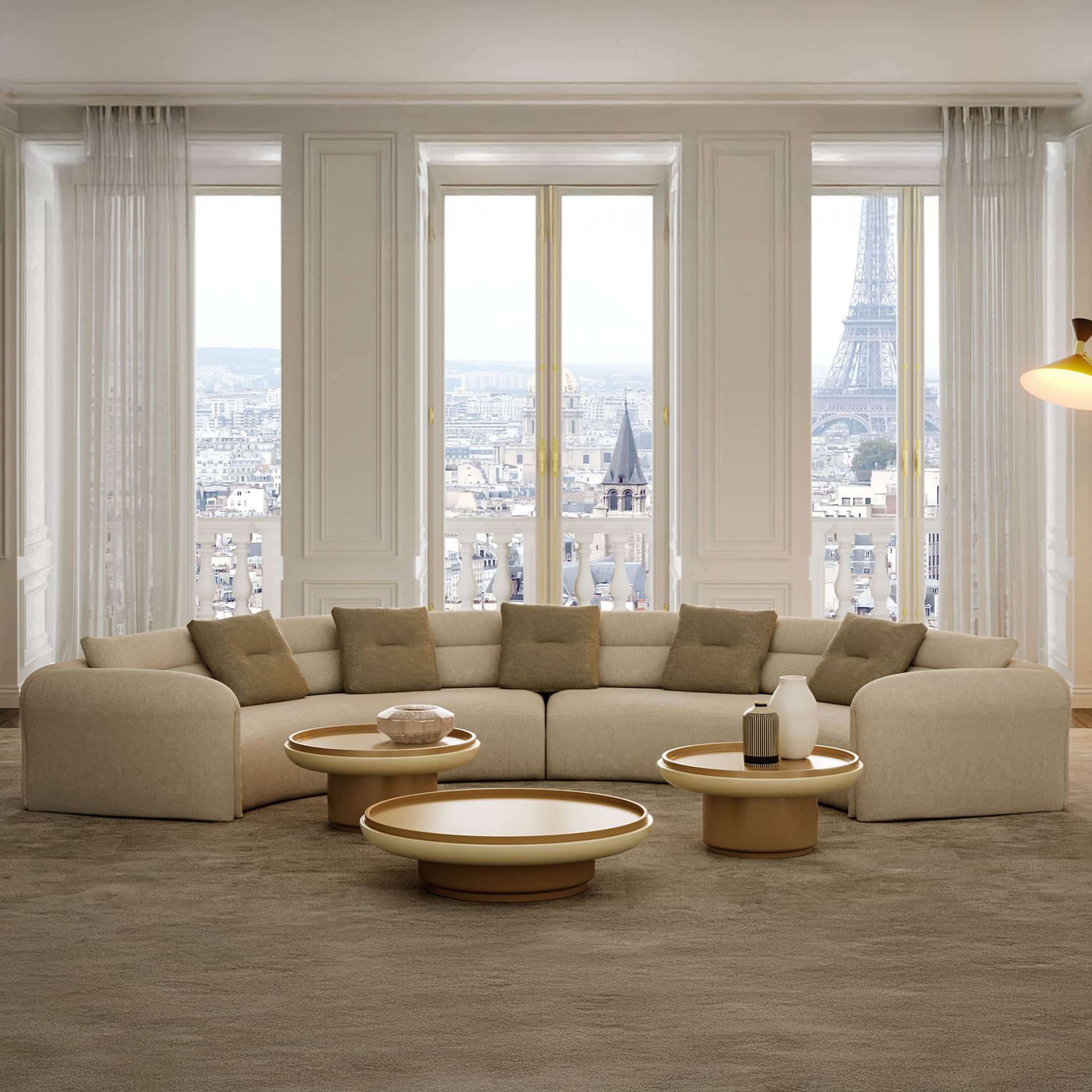 Quentin Amphitheatre Circular Modular Sofa in front of floor-to-ceiling windows with a circular arrangement.