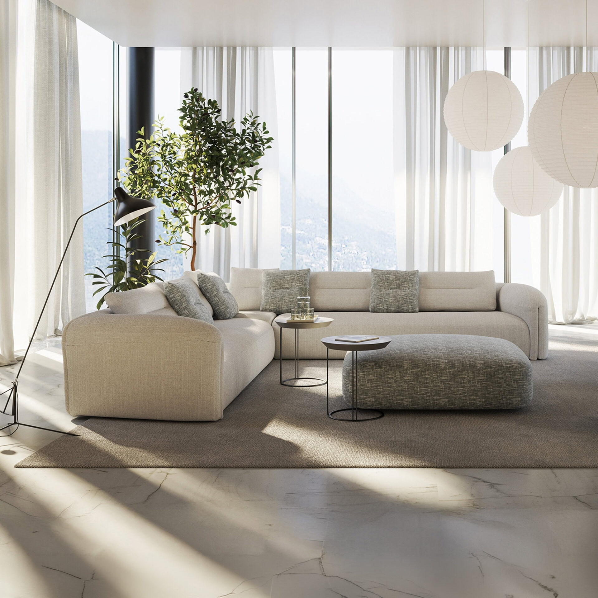 Quentin Angular Modular Sectional Sofa in a bright modern living room with white upholstery and natural light.