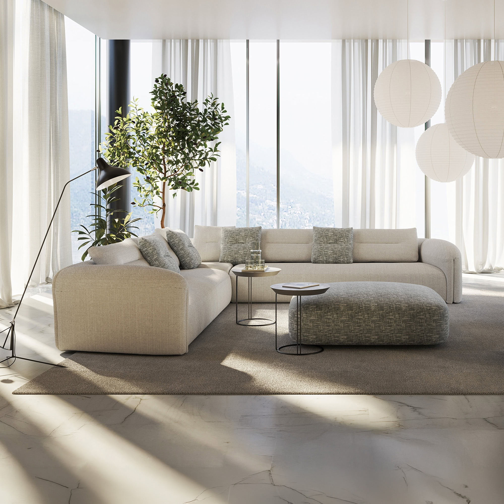 Quentin Angular Modular Sectional Sofa in a bright modern living room with white upholstery and natural light.