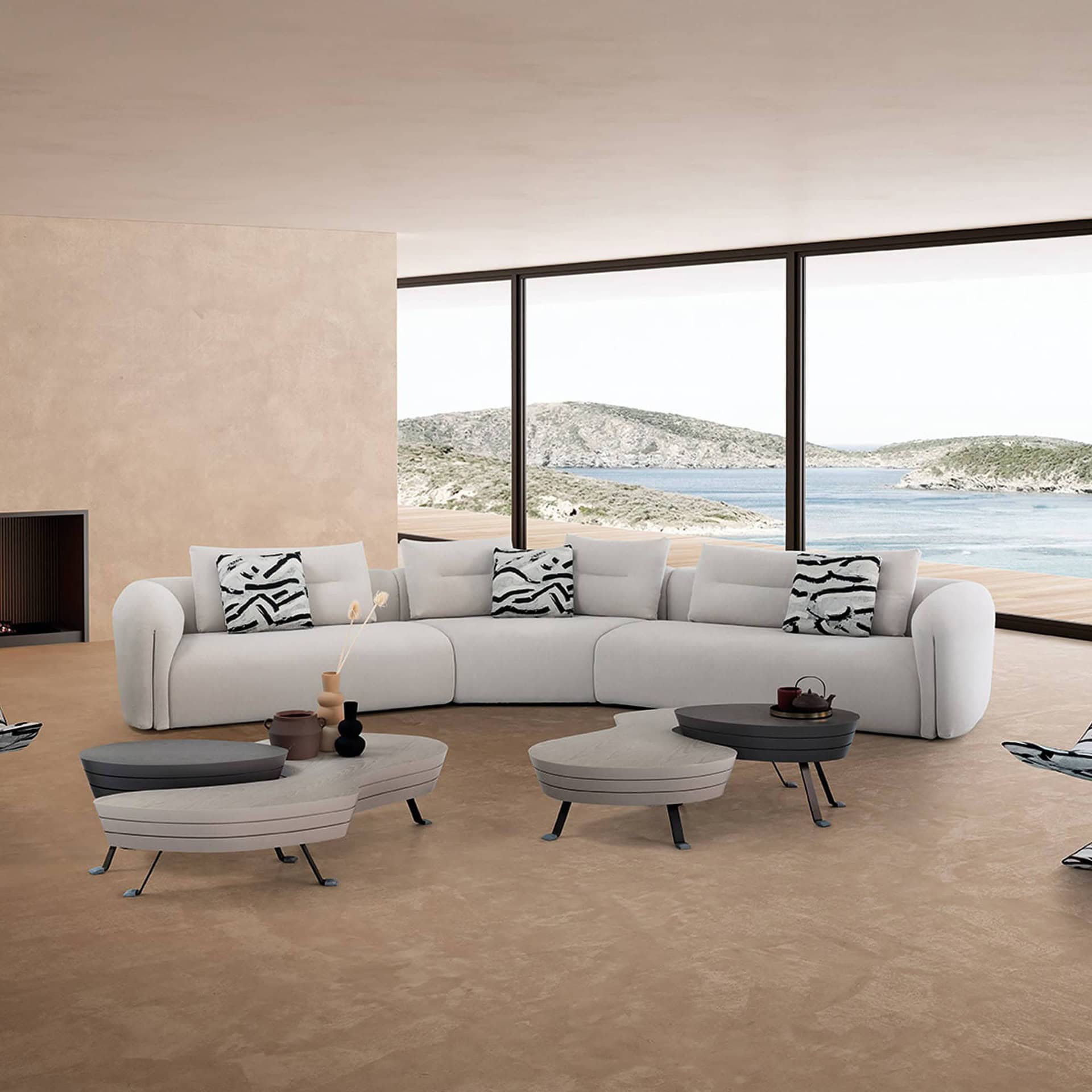 Quentin Angular Modular Sectional Sofa in light beige fabric arranged in a spacious windowed room.