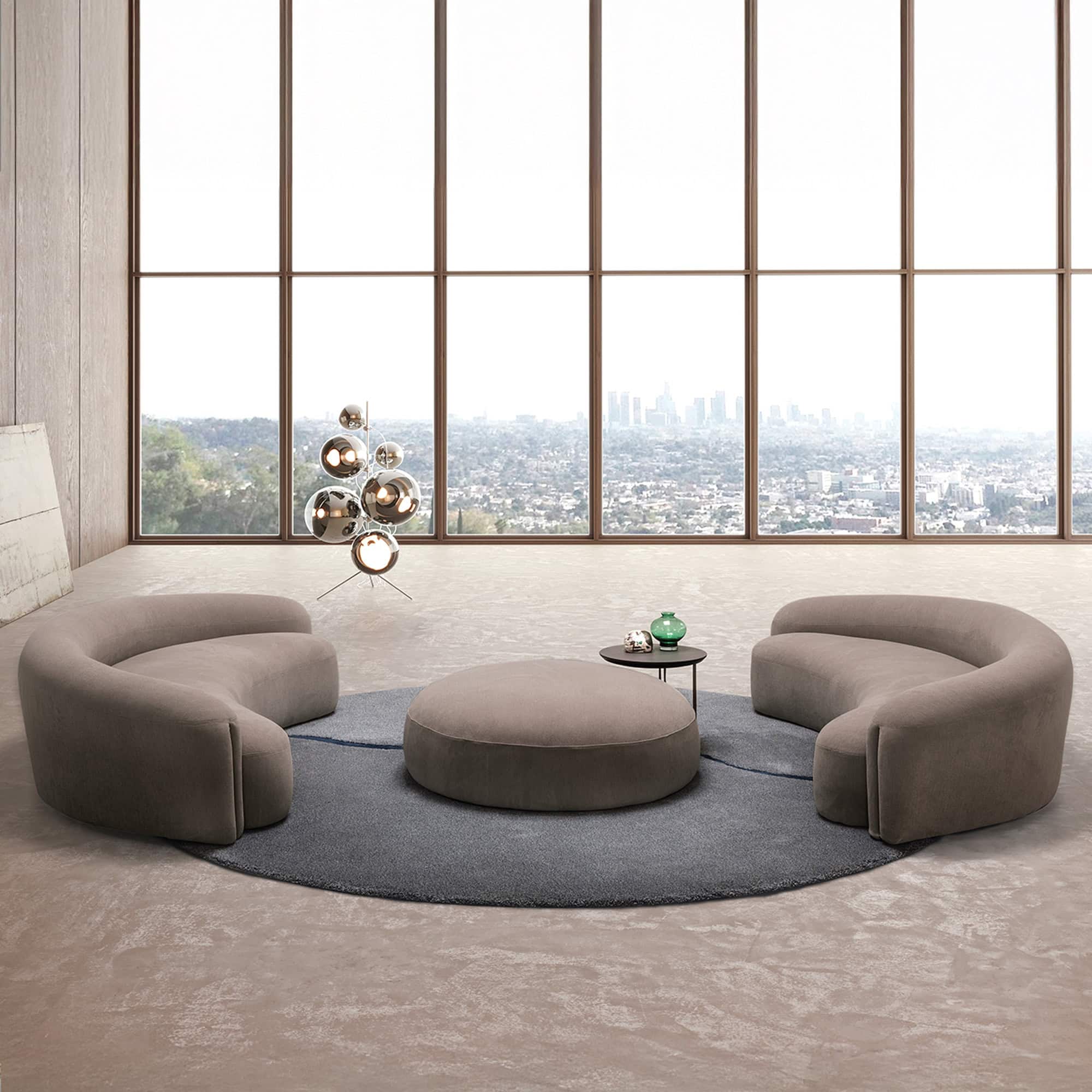 a large room with a large window and a large sofa