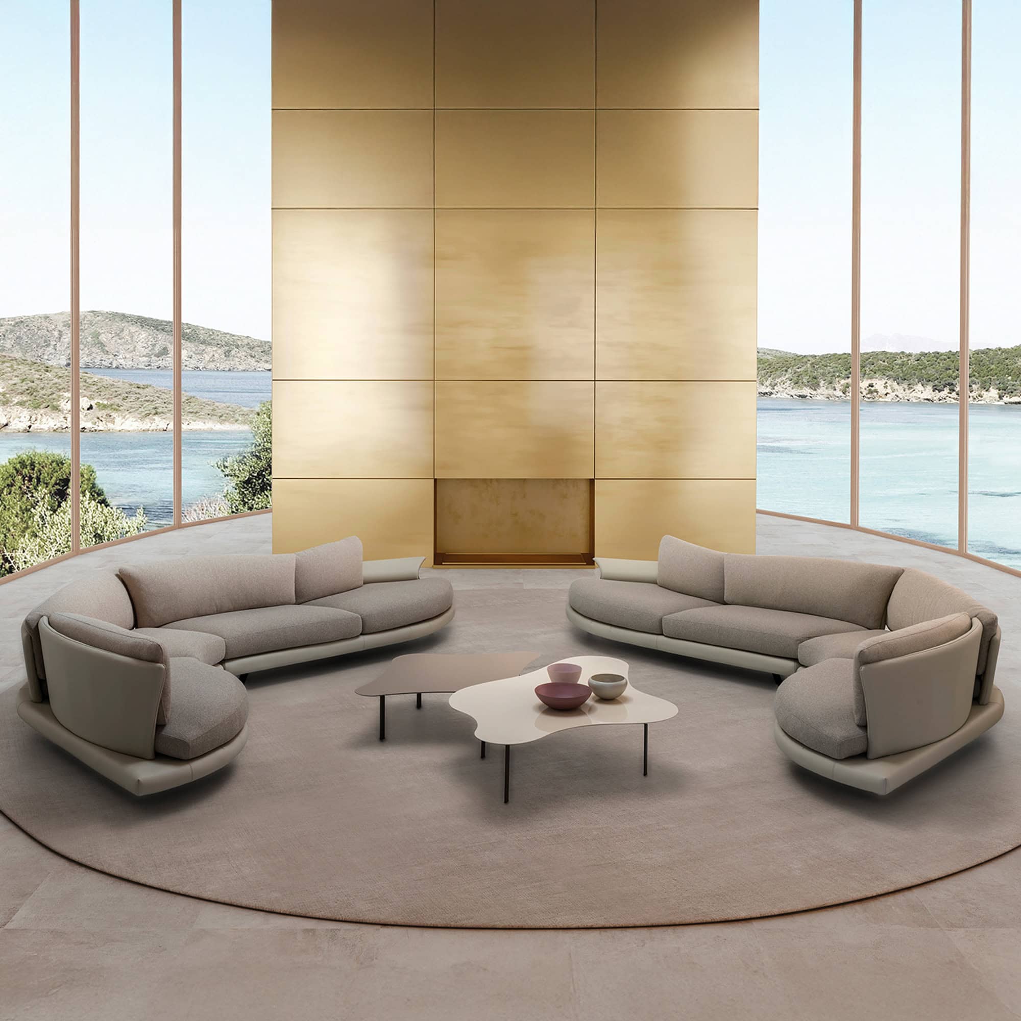 a room with a round sofa and a table