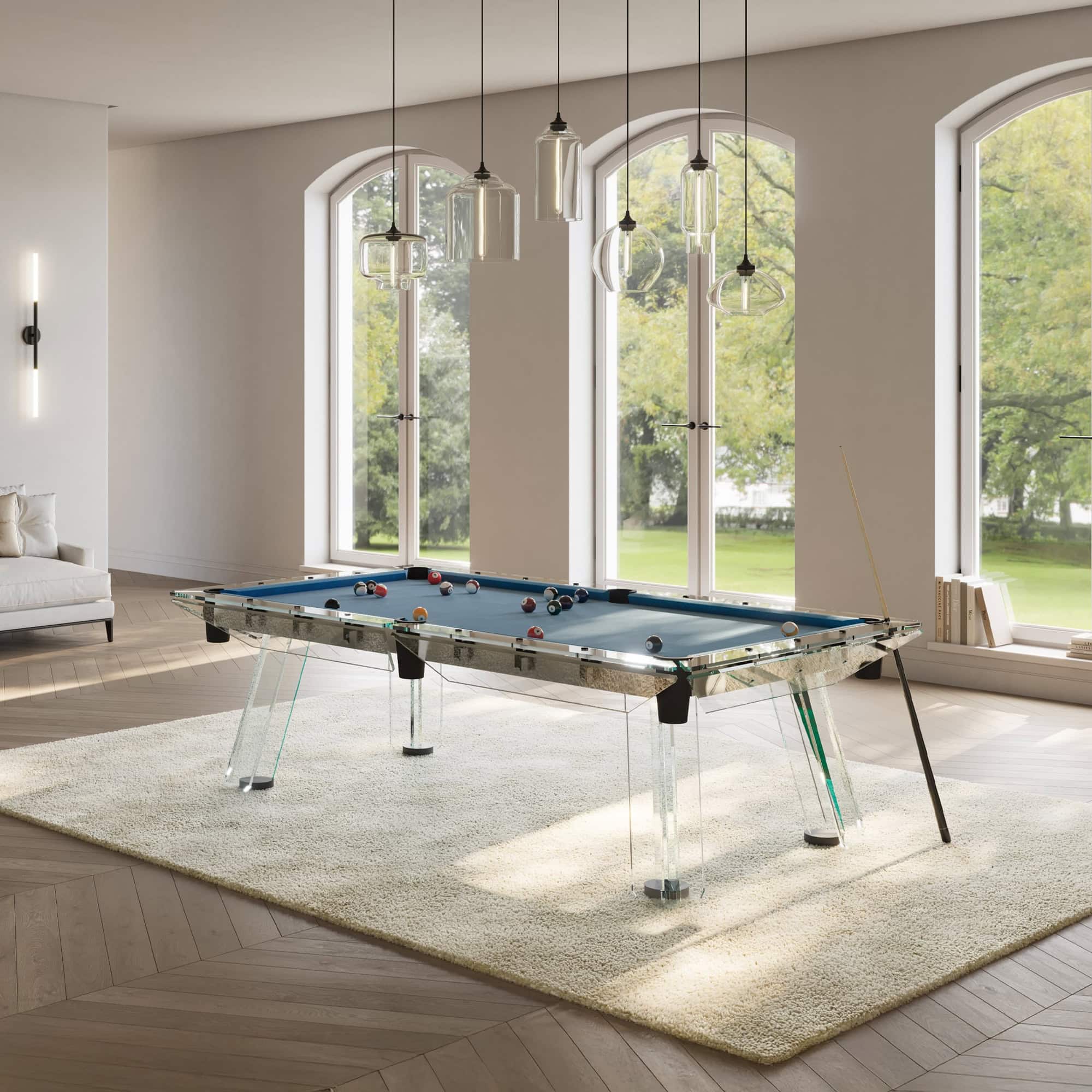 Filotto Luxury Pool Table in a modern living space with floor-to-ceiling windows.