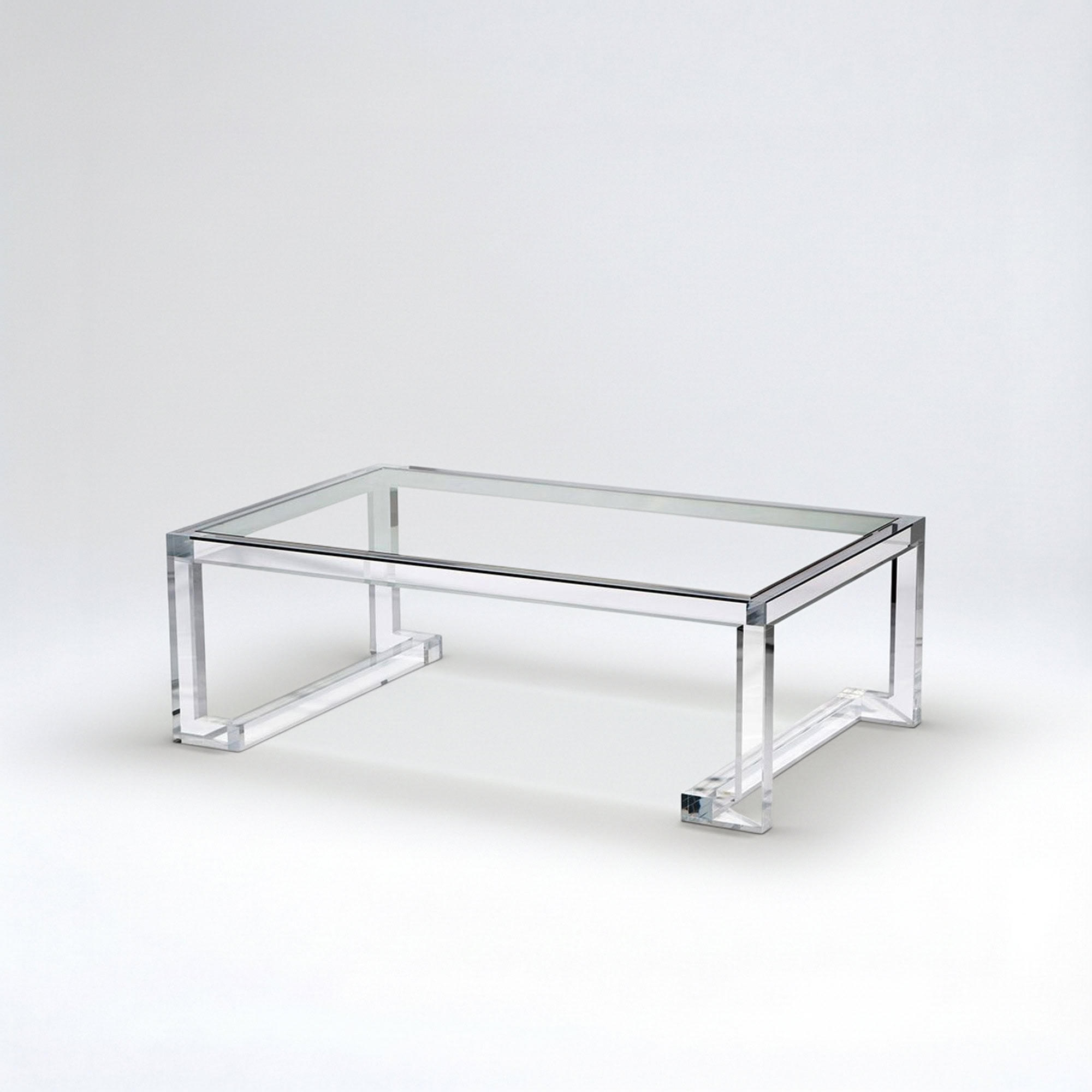 Acrylic cocktail table with sleek, modern design for contemporary living spaces.
