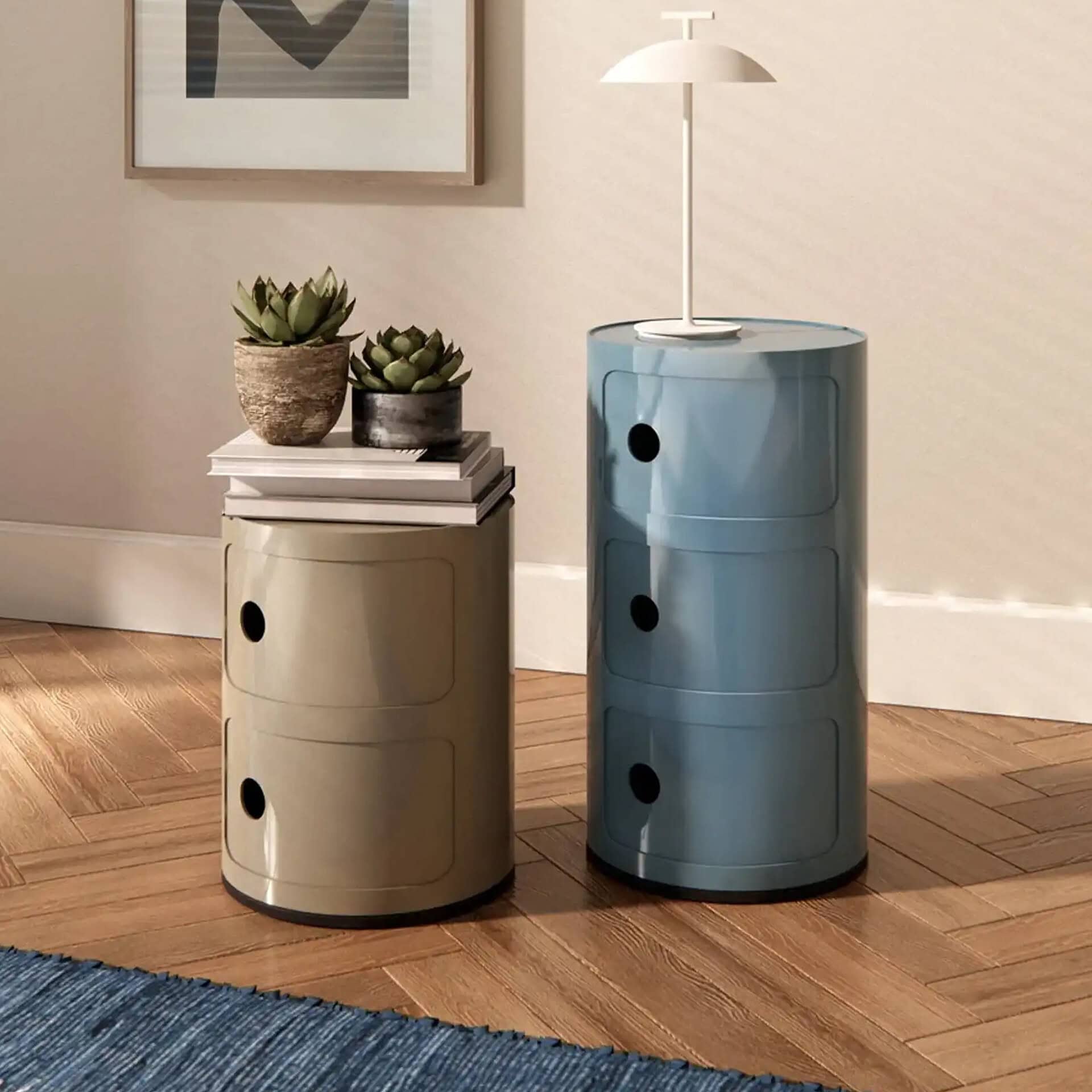 Modern cylindrical nightstands with storage drawers in beige and blue.