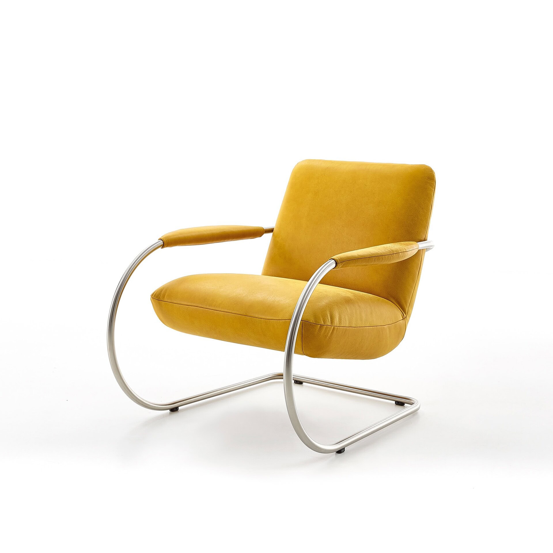 Side angle of the Jumper Cantilever Armchair in yellow, showing its sleek cantilever frame.