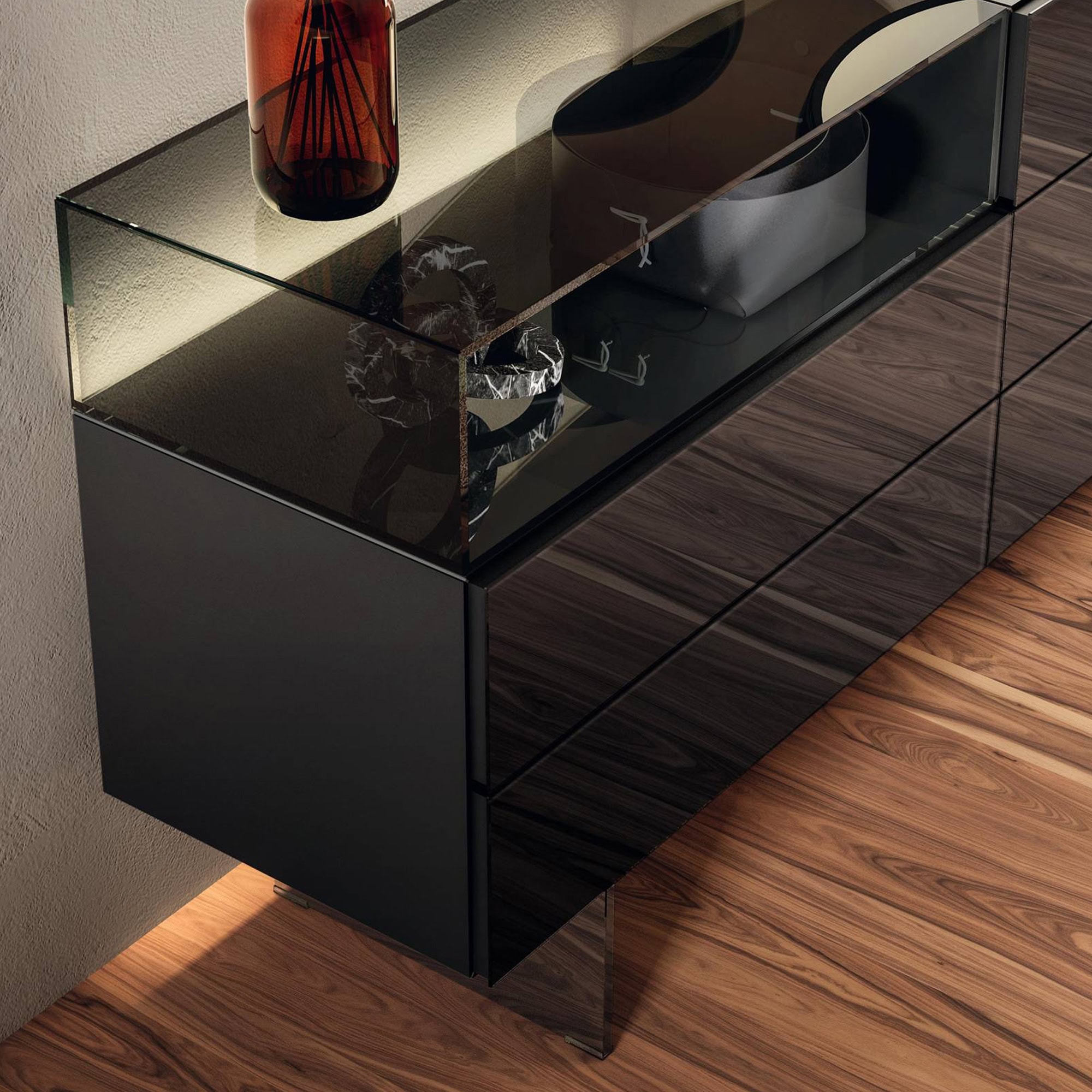 Close-up view of the Lago 36e8 Glass Dresser 1904 showing the reflective smoked glass surface, top storage display, and clean-lined detailing.