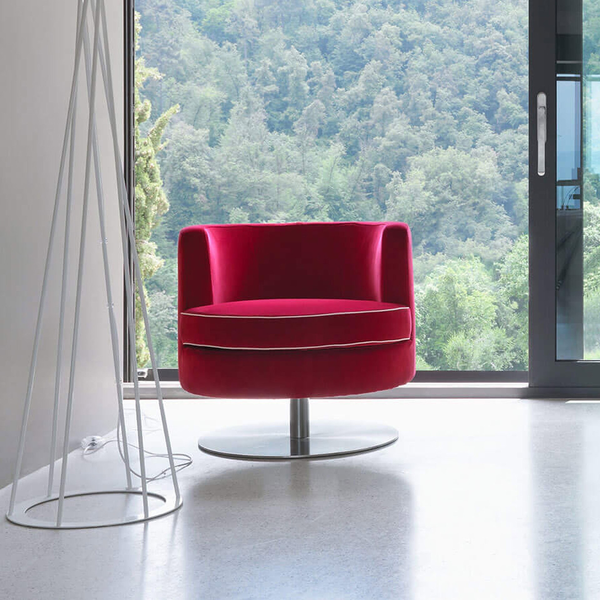 Swivel lounge chair with vibrant red upholstery, modern design, perfect for contemporary living spac.