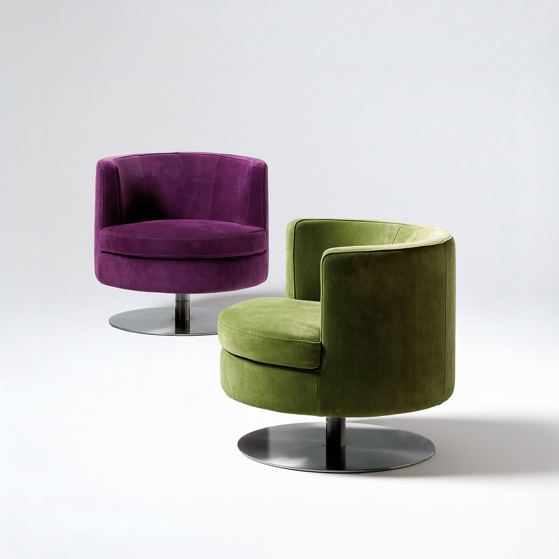 Stylish swivel lounge chairs in purple and green with sleek metal bases.