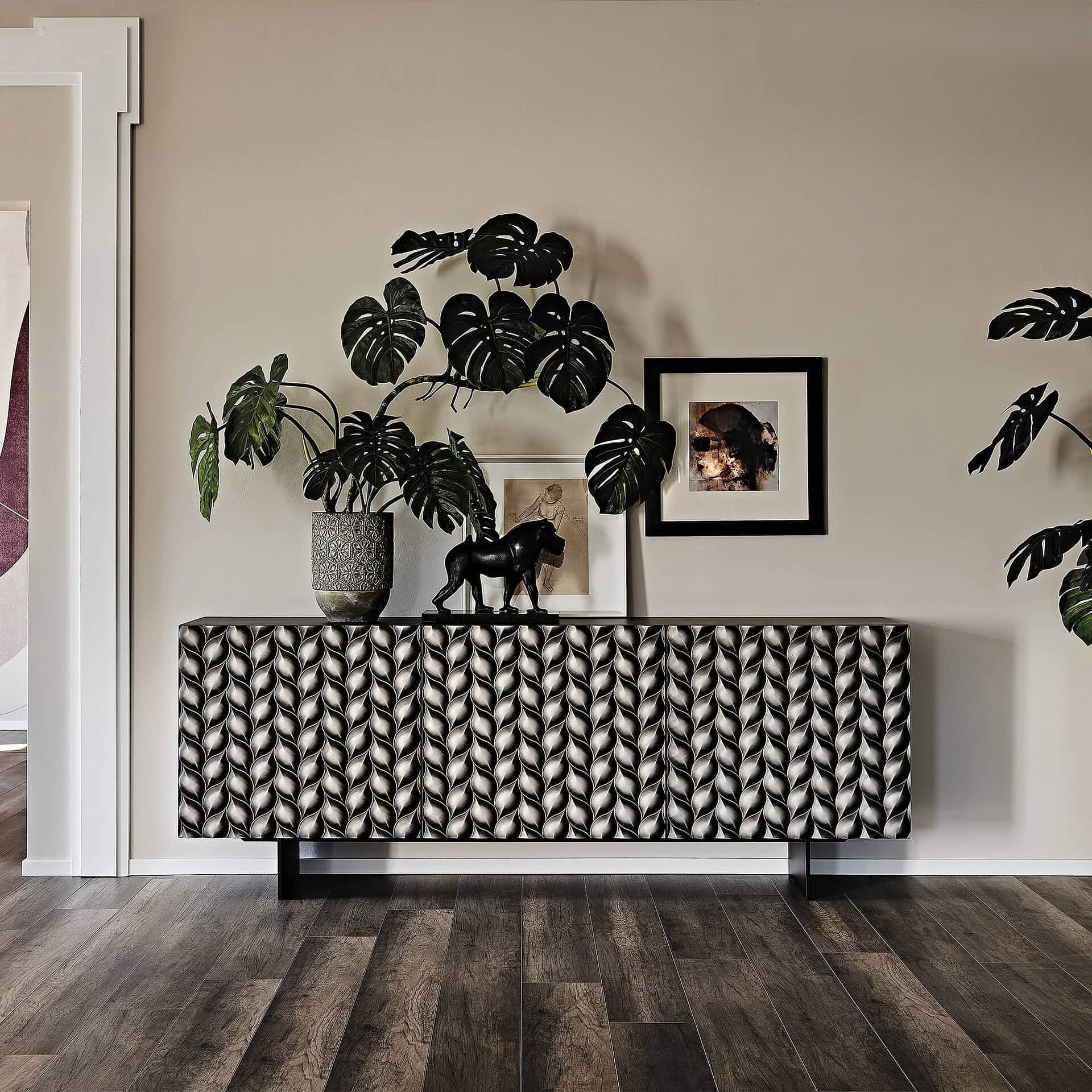 Lavander Sideboard in brushed grey finish styled with plants in a modern living room