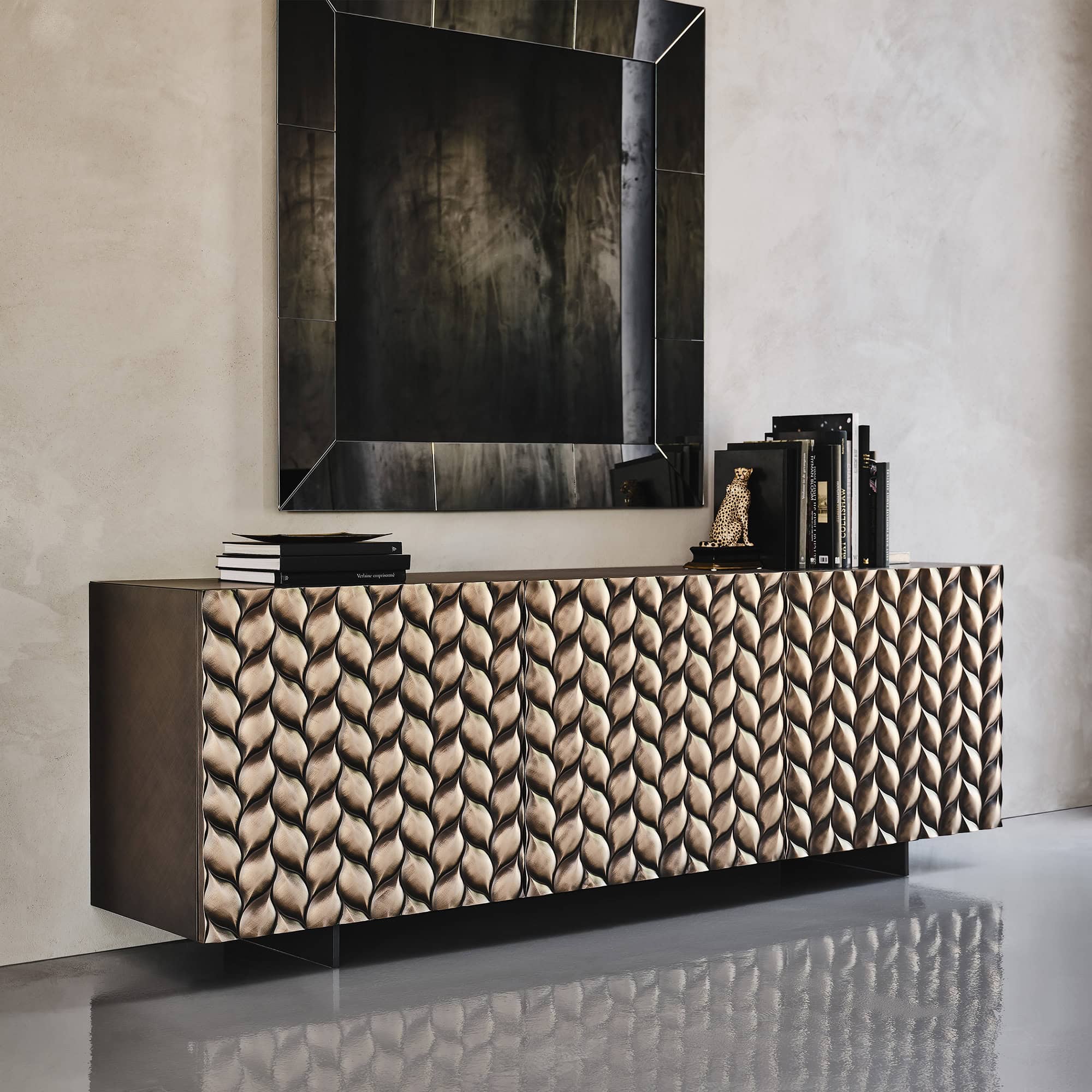 Luxurious modern buffet with intricate sculpted wood finish and sleek design.