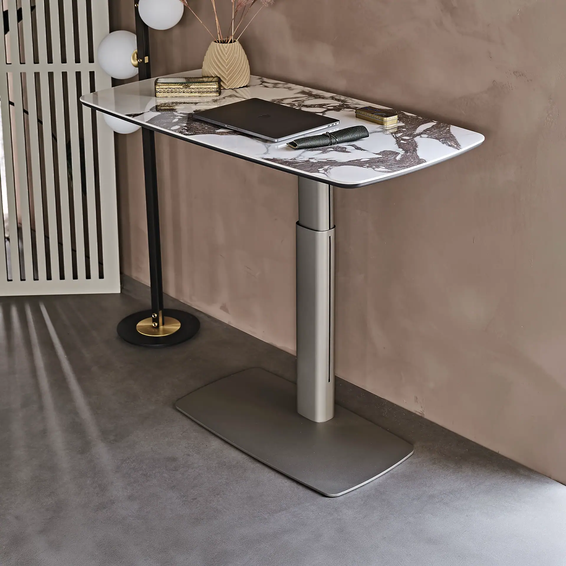 Sklar Furnishings height-adjustable desk with marble top and modern design.