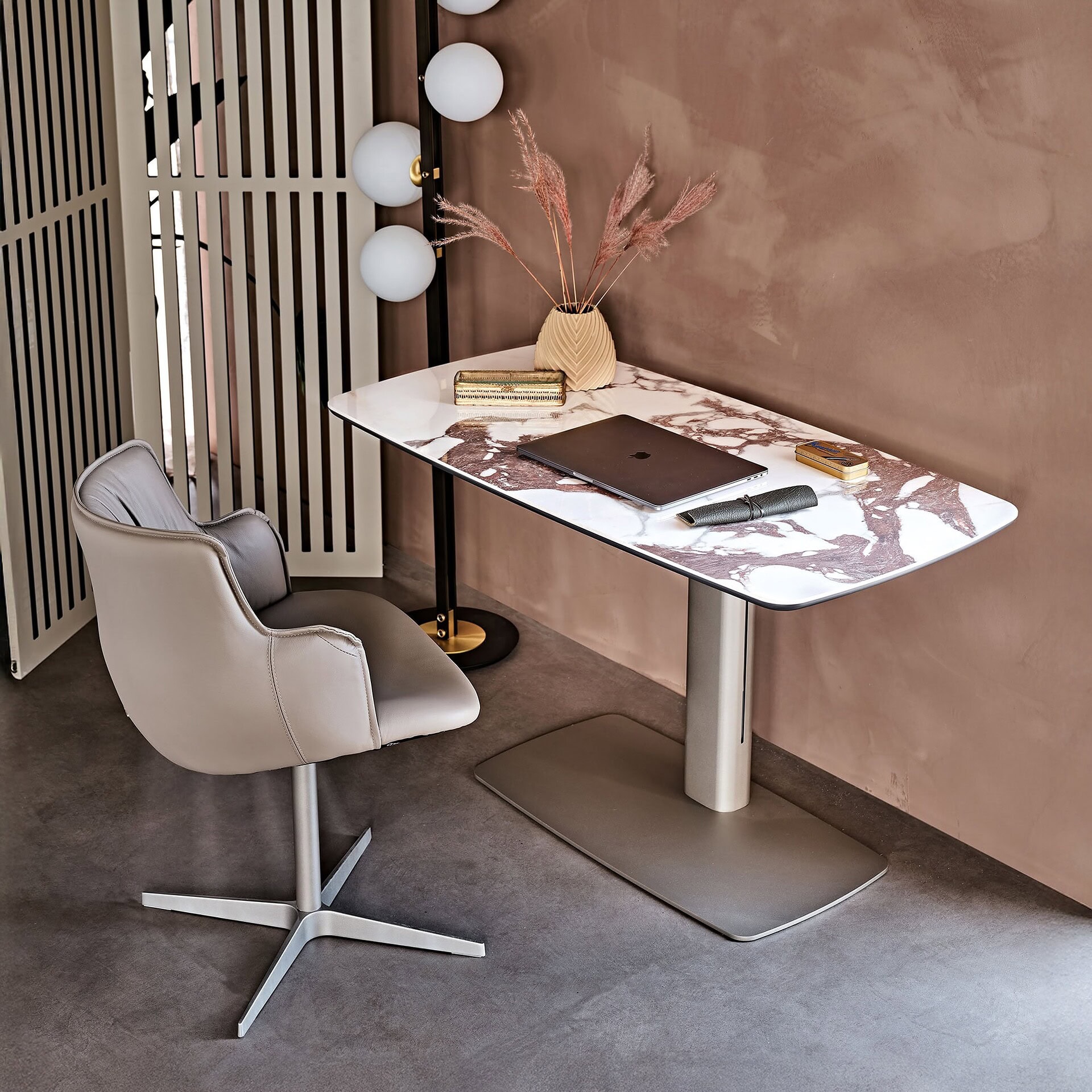 Elegant marble desk with modern design for home office or workspace decor.
