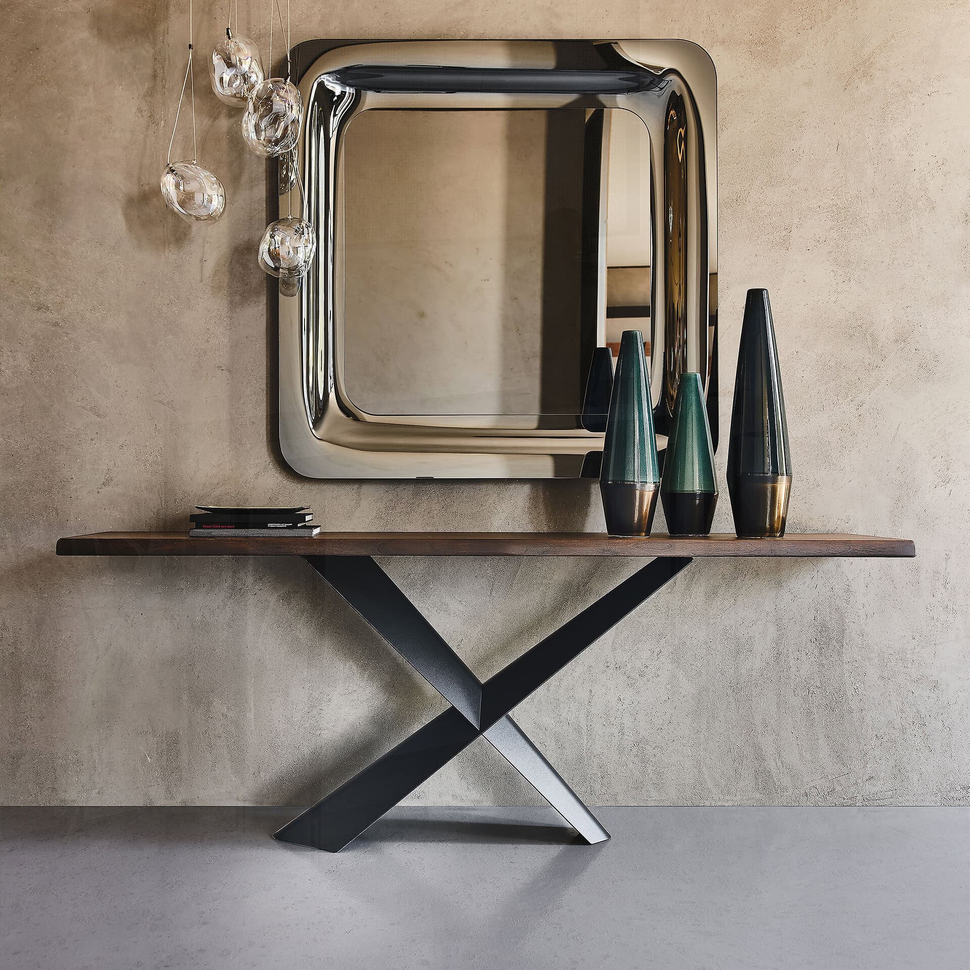 Terminal Console Table by Cattelan Italia shown in a modern entryway with decorative accents and mirror above.