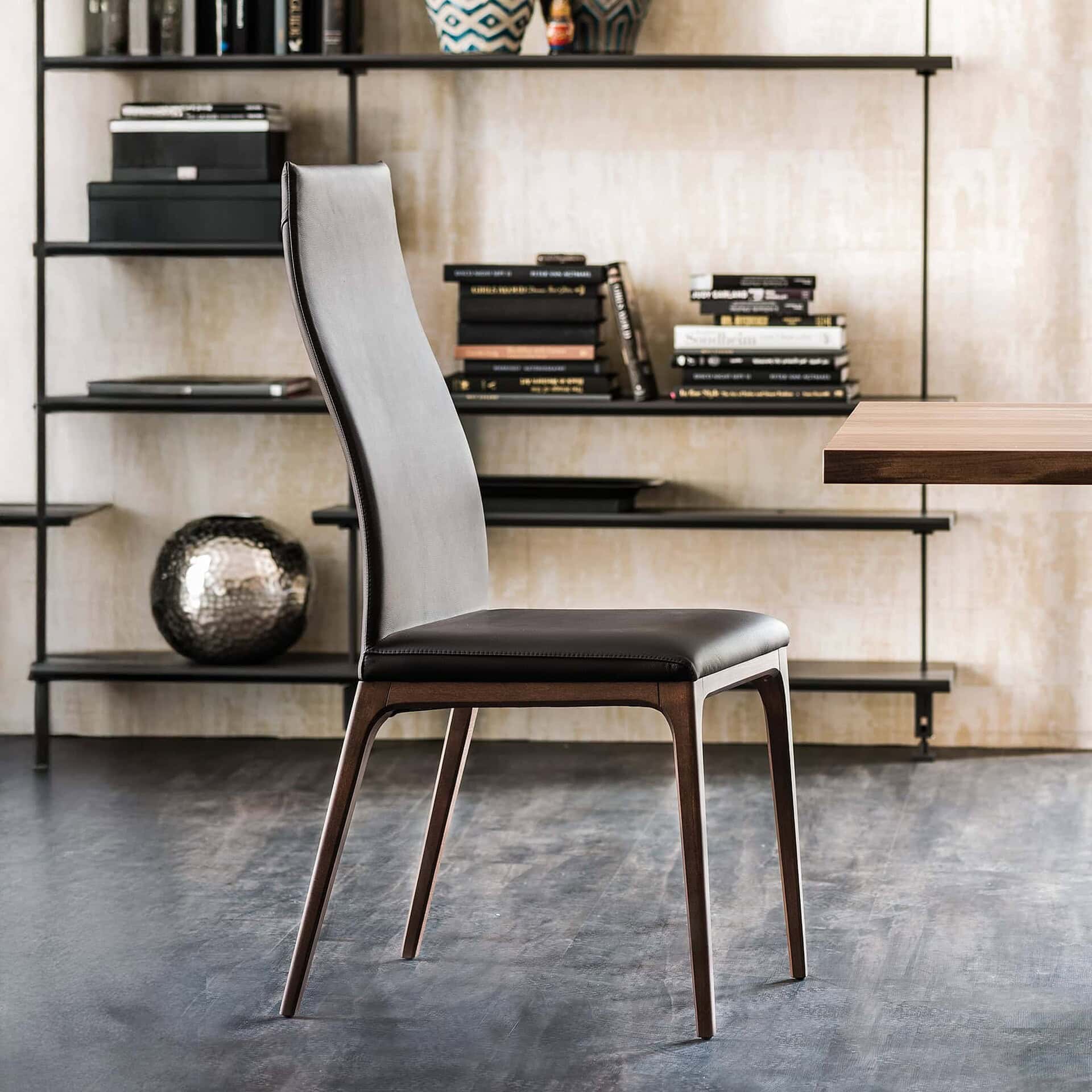 Side view of the Arcadia High Back Dining Chair with tall upholstered back and wooden frame.