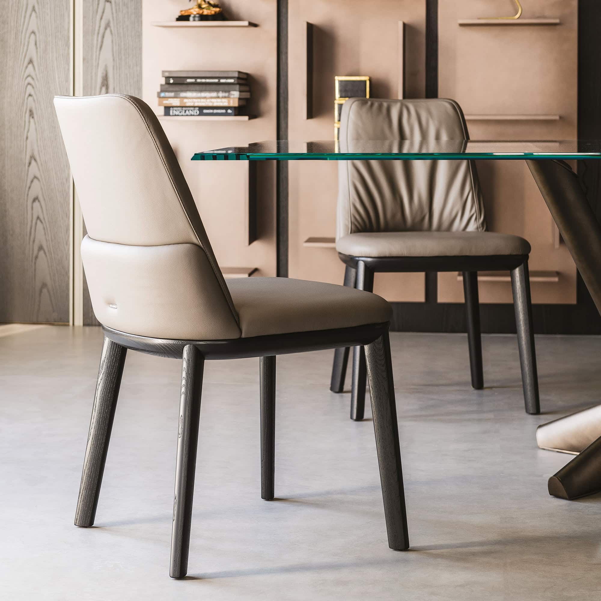 Side profile of the Belinda Dining Chair showing sleek curves and ashwood frame.