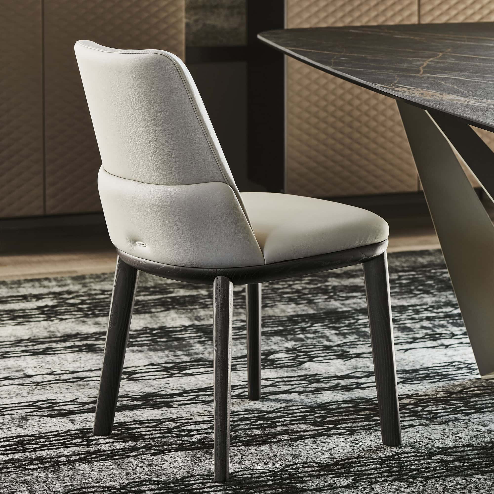 Back view of the Belinda Dining Chair highlighting its contoured silhouette.