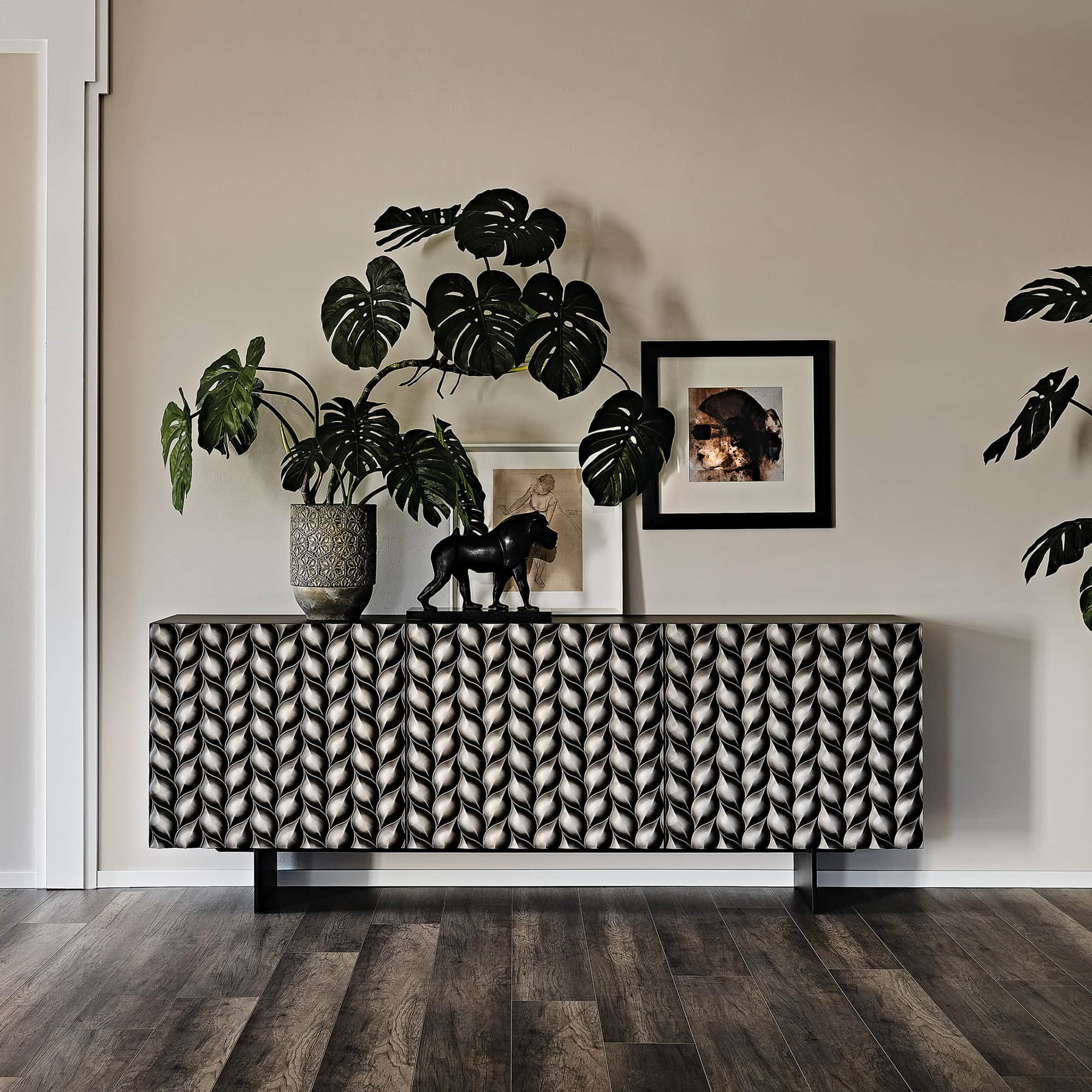 Lavander Sideboard in brushed grey finish styled with plants in a modern living room