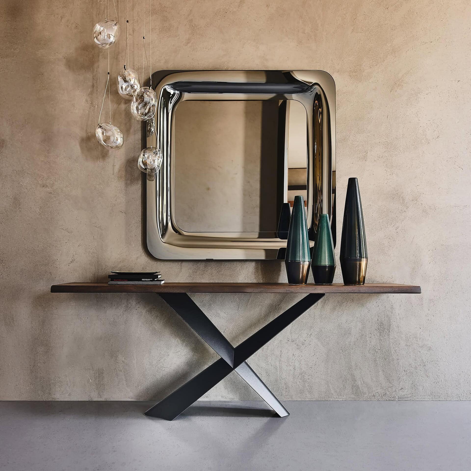 Terminal Console Table by Cattelan Italia shown in a modern entryway with decorative accents and mirror above.