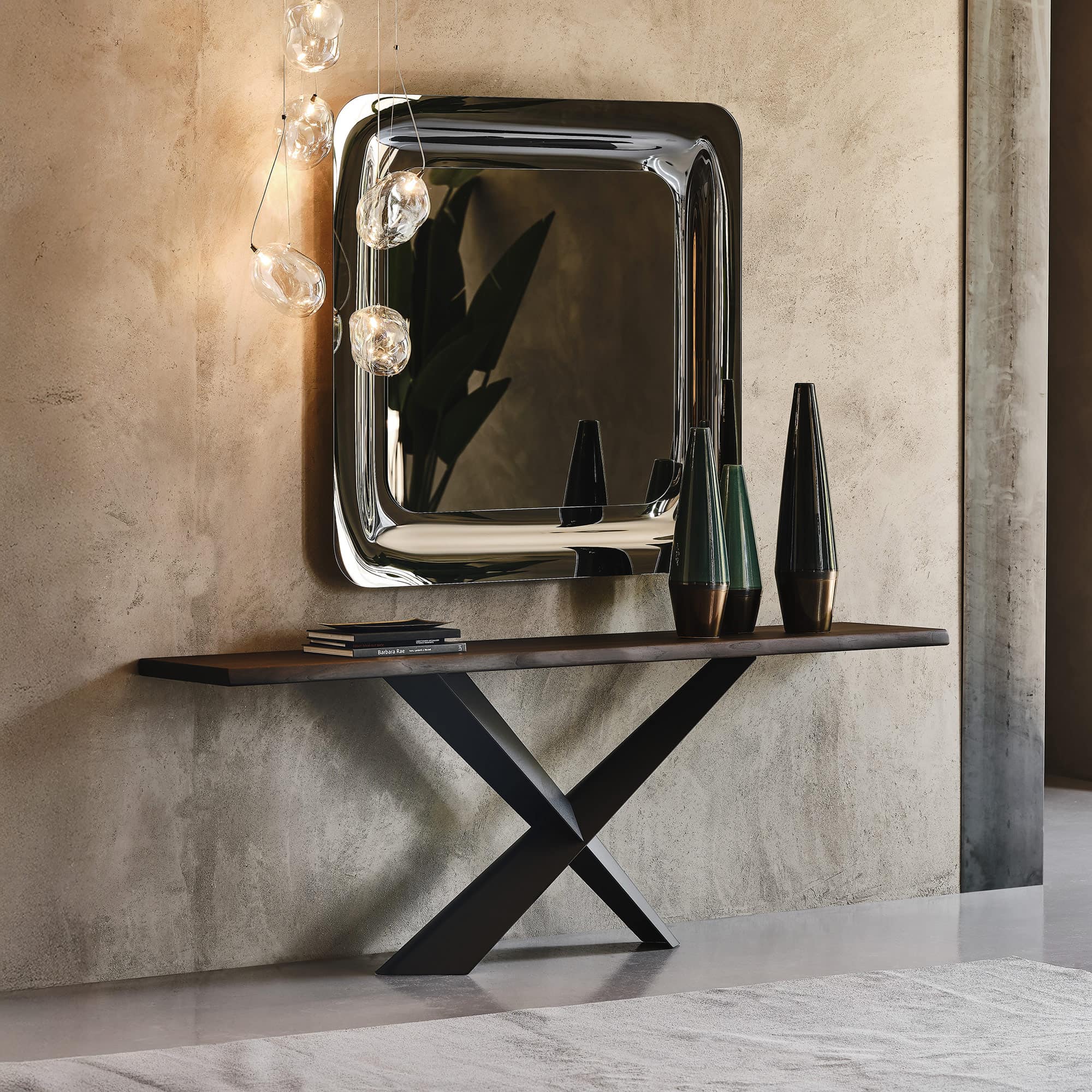 Side angle of the Terminal Console Table highlighting the sculptural metal base and natural wood top.