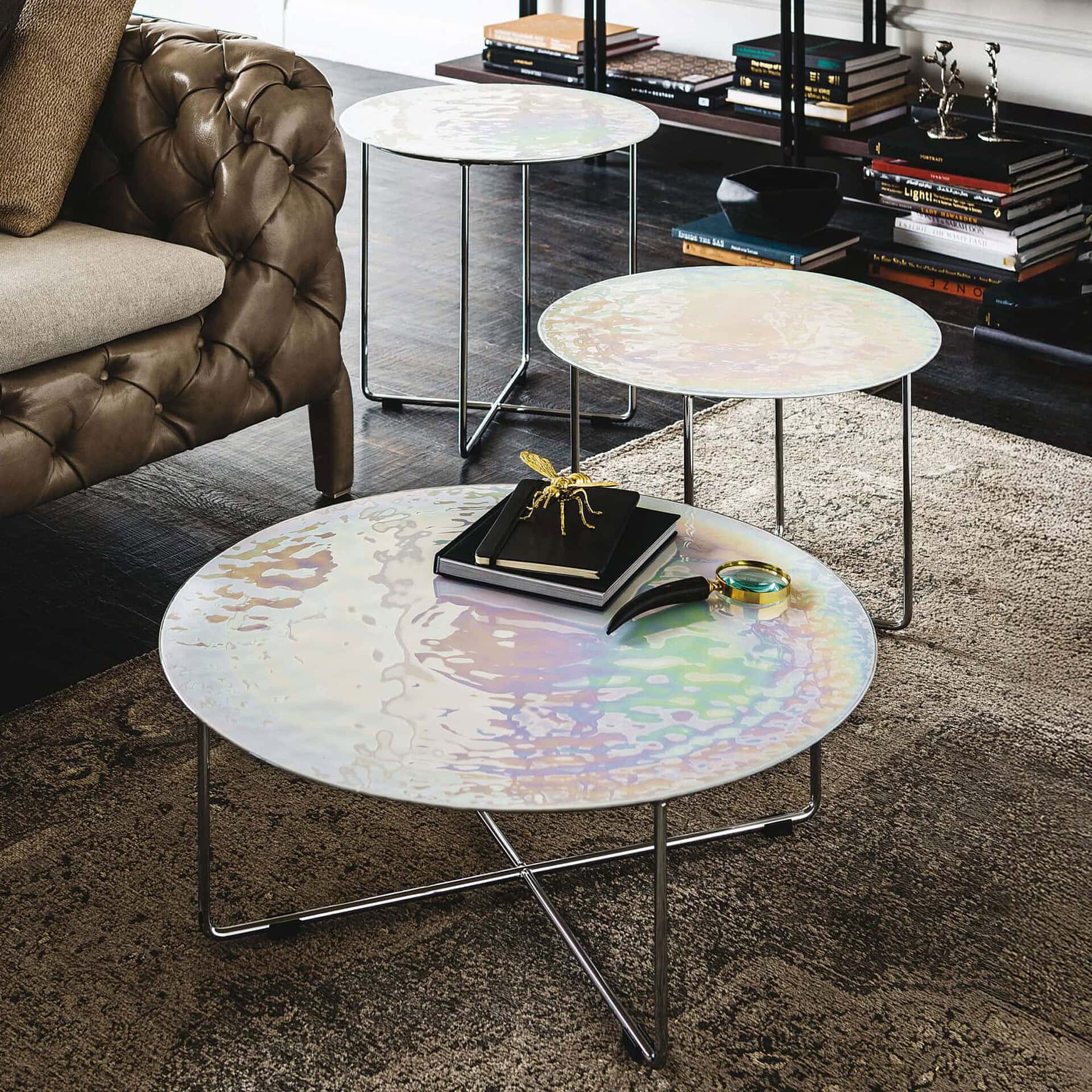 Set of Vinyl Coffee Tables with Murano glass tops in a mixed arrangement showcasing height variations.