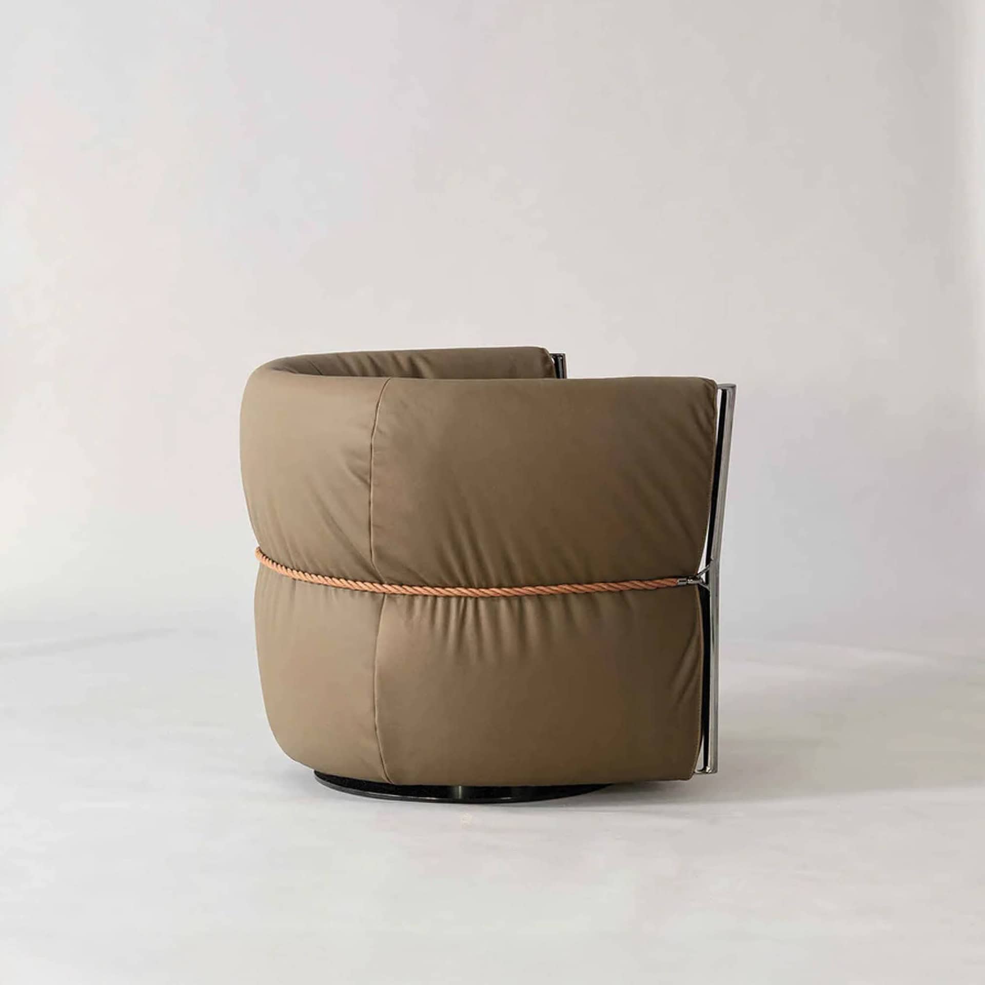 Belt Swivel Armchair rear view highlighting the gathered leather detailing and craftsmanship.