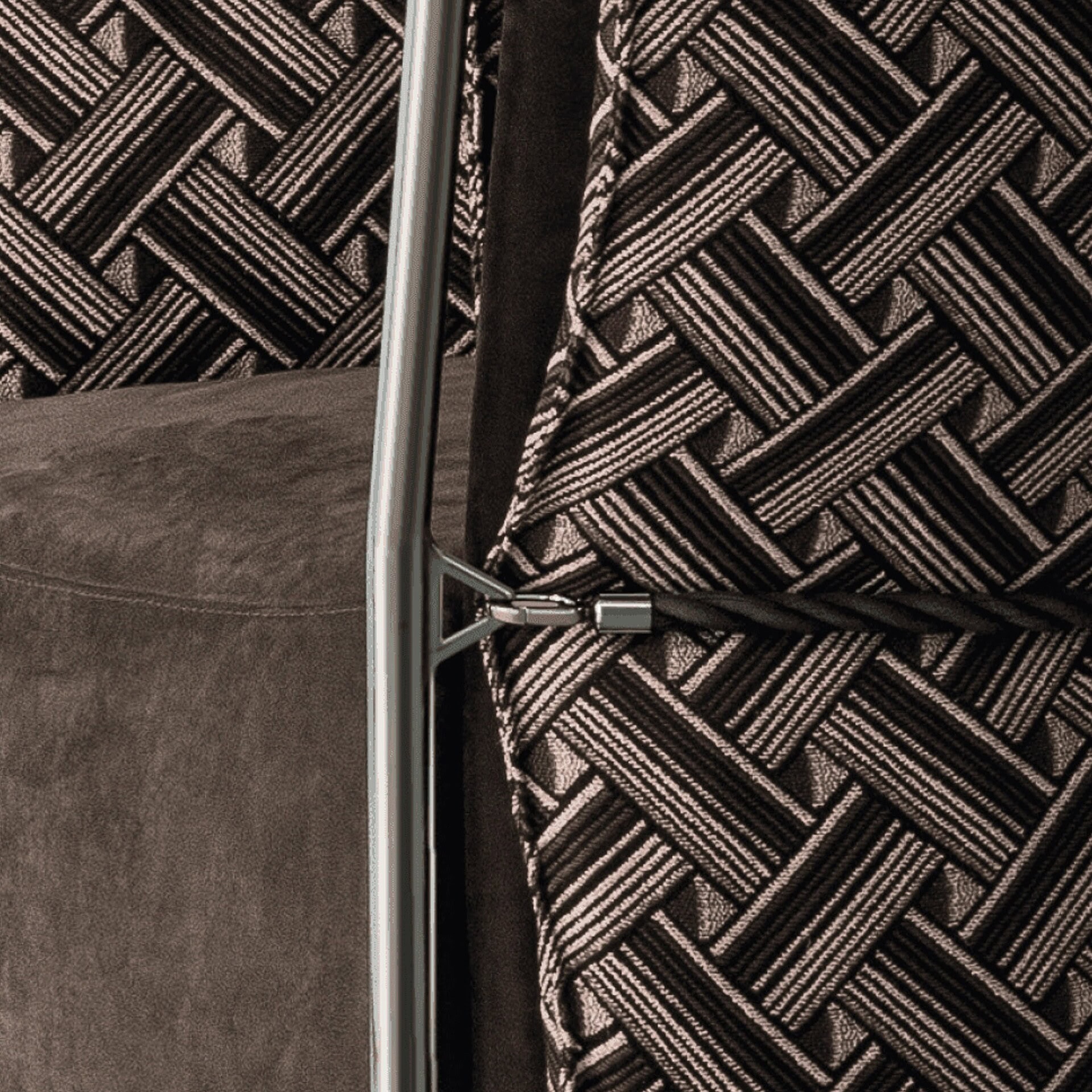 Belt Swivel Armchair rear view highlighting the gathered leather detailing and craftsmanship.