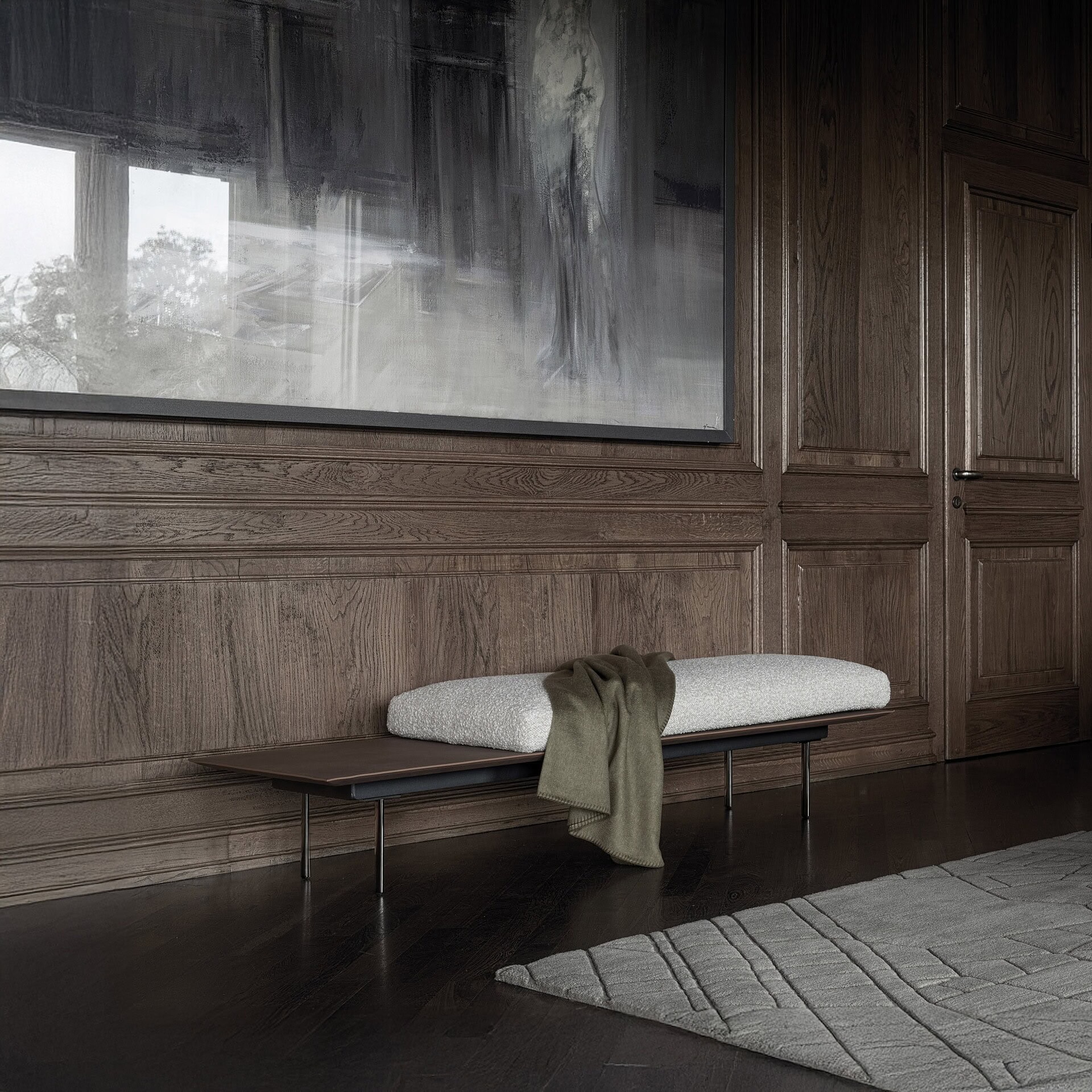 Vogue Bench in a sophisticated wood-paneled interior, styled with bolster pillow and soft throw.