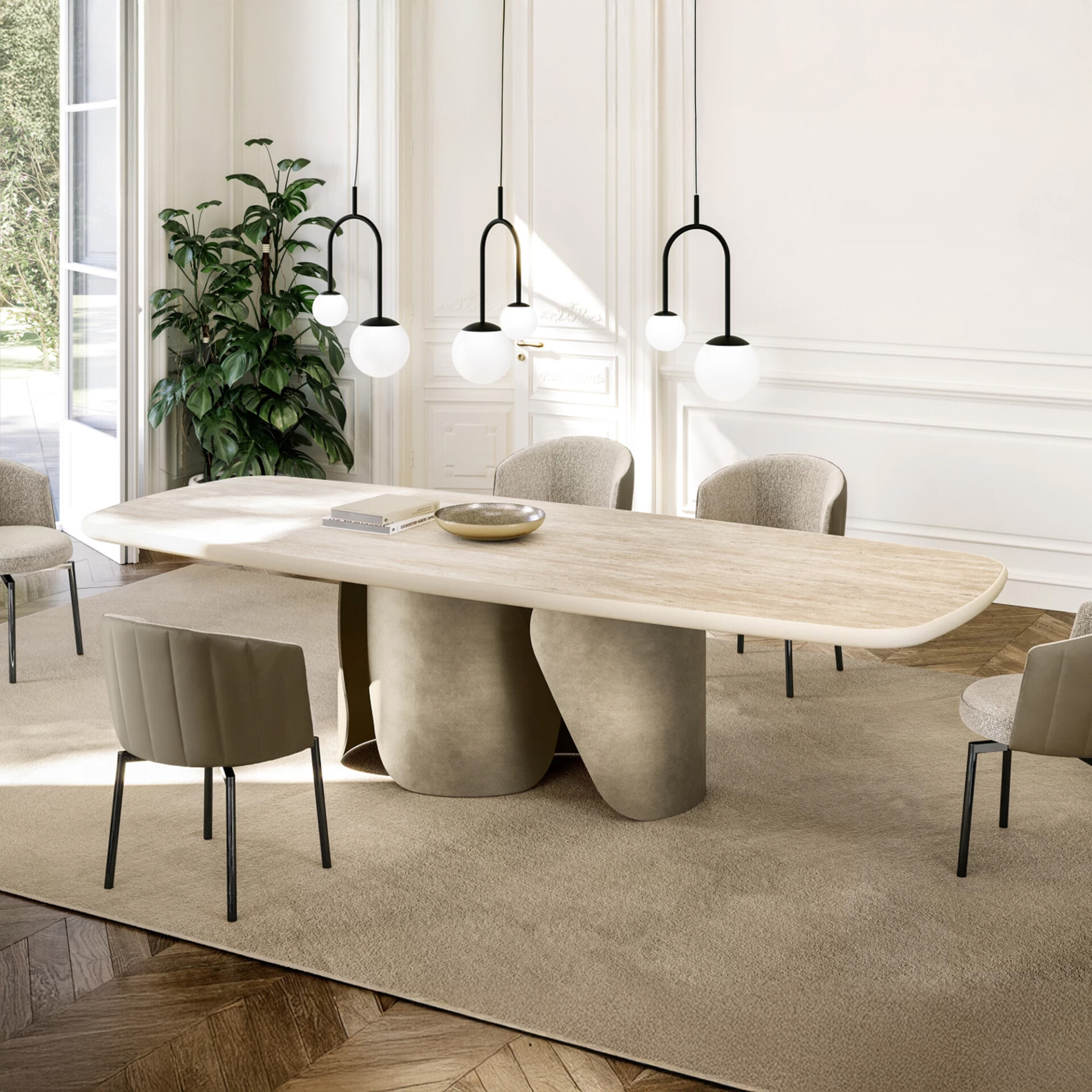 A modern dining room with an oval, light-colored table, six chairs, and three black arched pendant lights with white globes. A large beige rug covers a wooden parquet floor. White paneled walls and a large plant are visible.