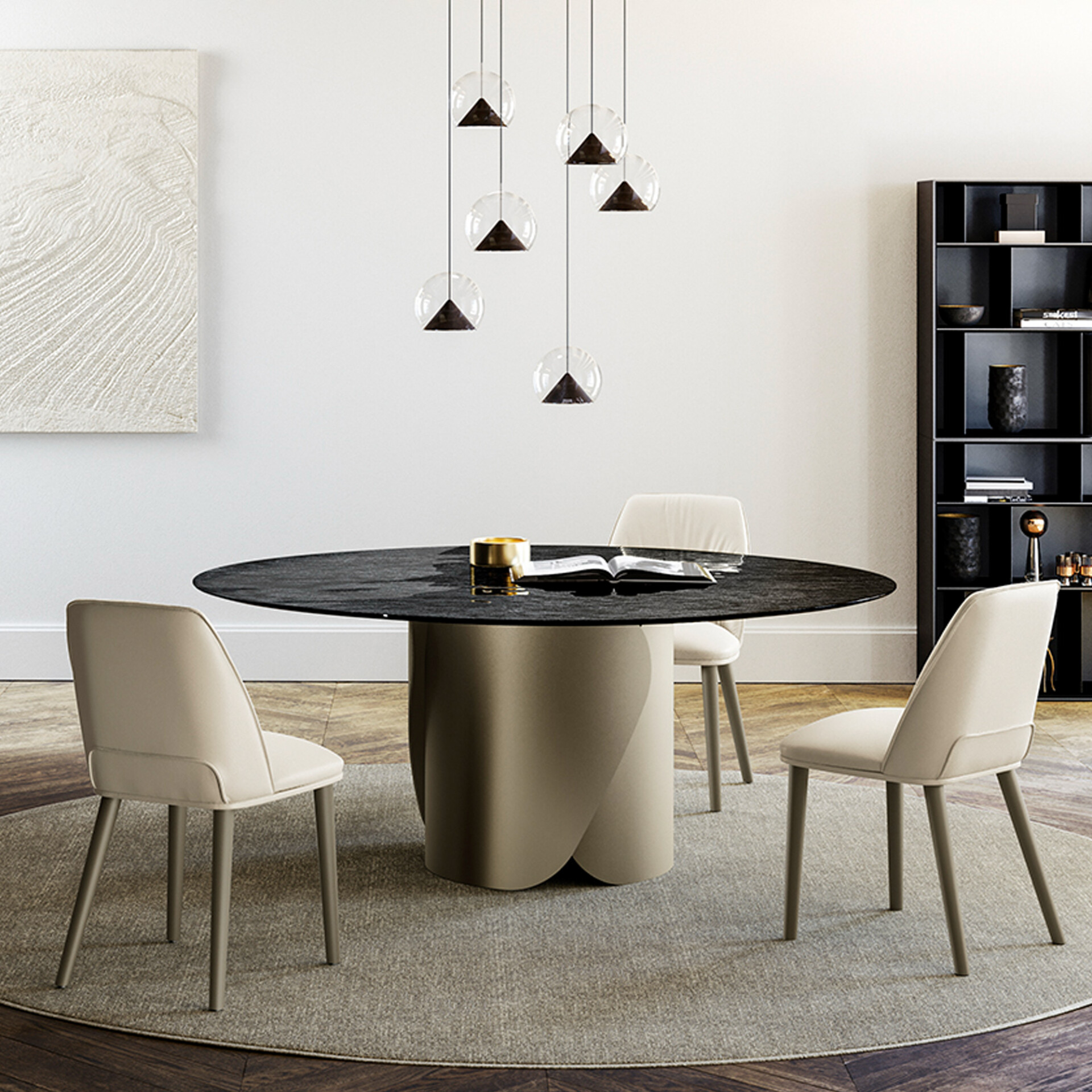 A modern dining room with a round dark table, light beige chairs, and a cluster of unique spherical pendant lights hanging above. A black open-shelf bookcase is on the right, and abstract art is on the left wall.