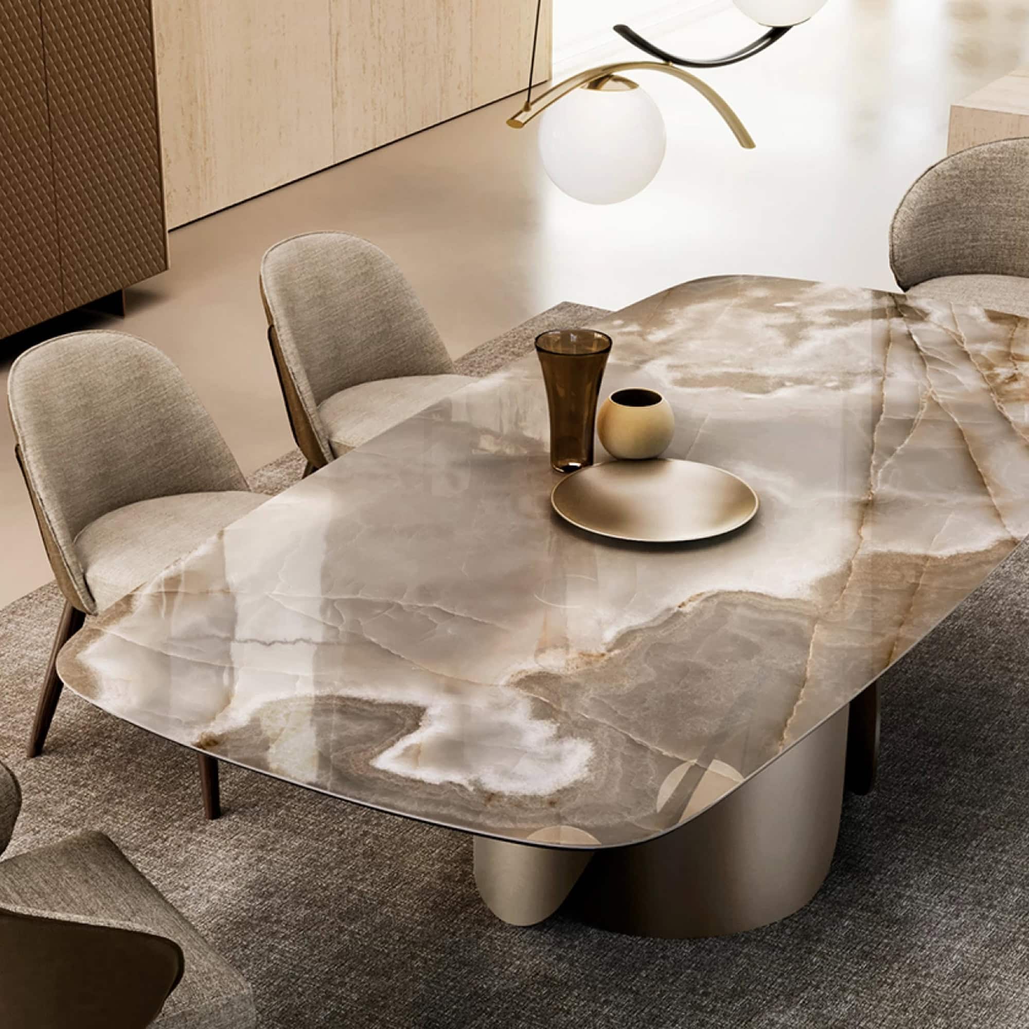 Luxurious marble dining table with modern design and comfortable upholstered chairs.